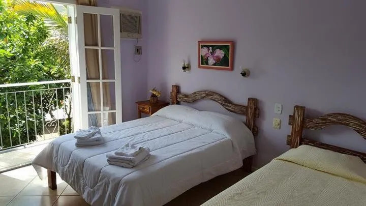 Balcony/Terrace, Bed in Pousada D'amoras
