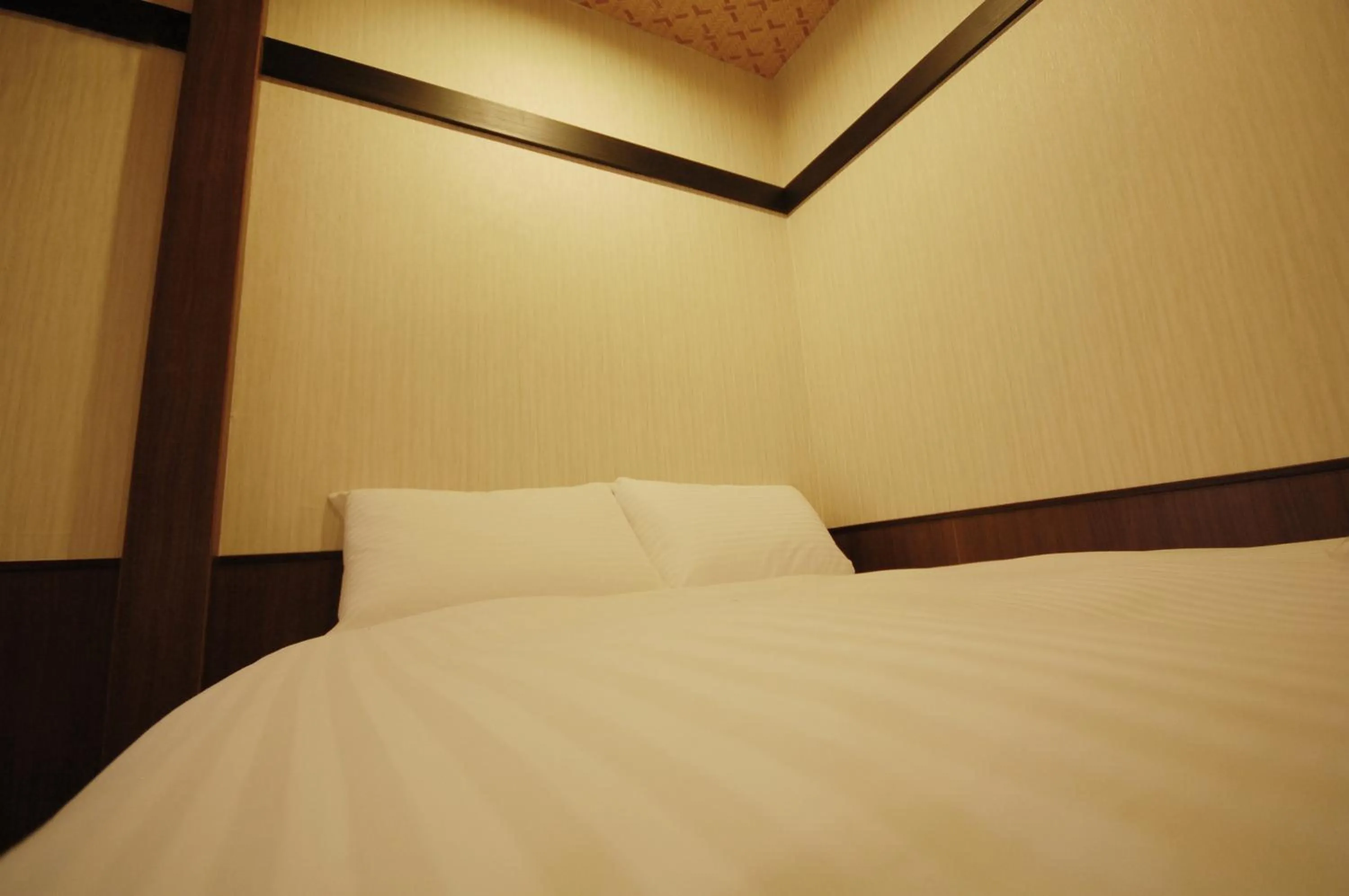 Decorative detail, Bed in Hananoi Bed and Breakfast