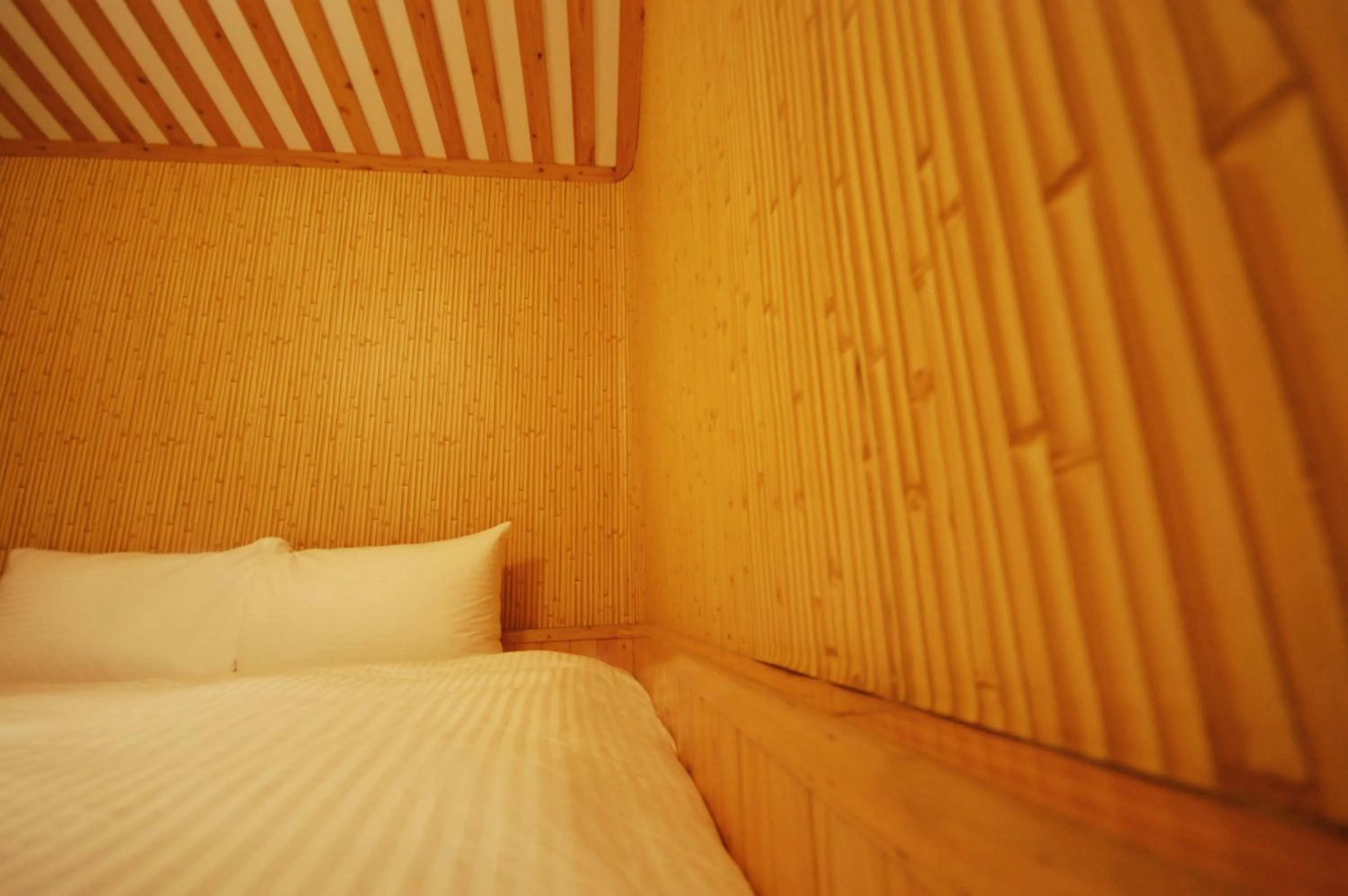 Decorative detail, Bed in Hananoi Bed and Breakfast