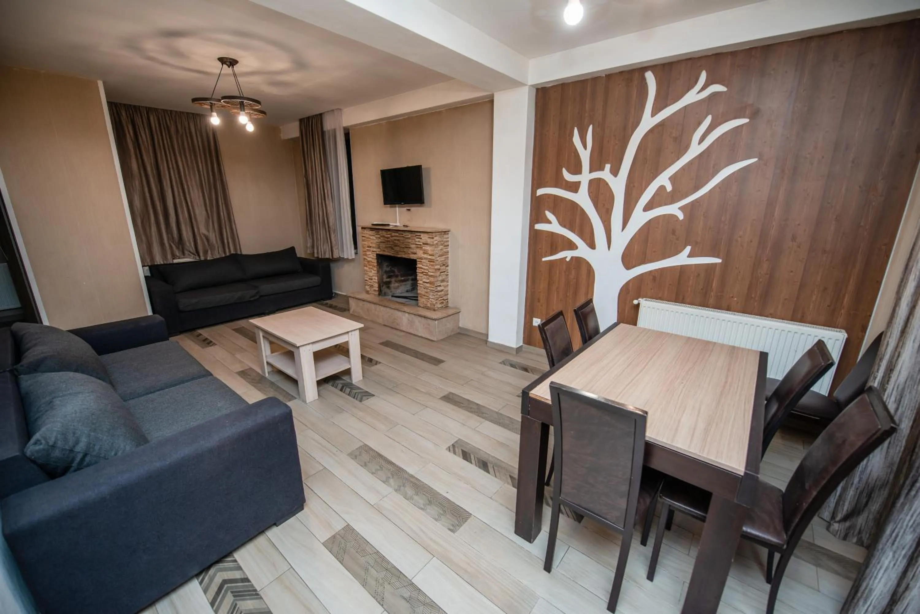Communal lounge/ TV room in Villa Garden