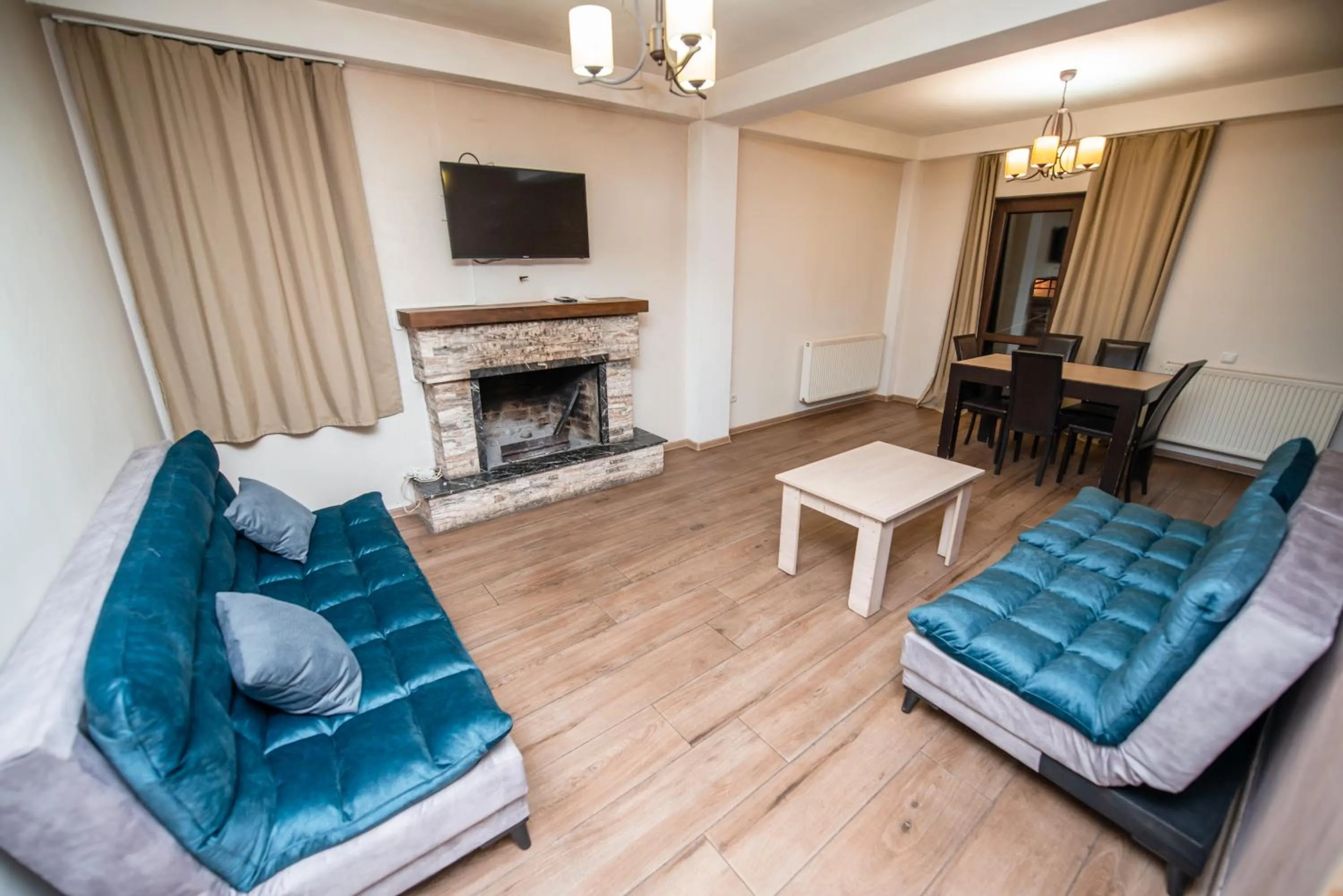 Communal lounge/ TV room in Villa Garden
