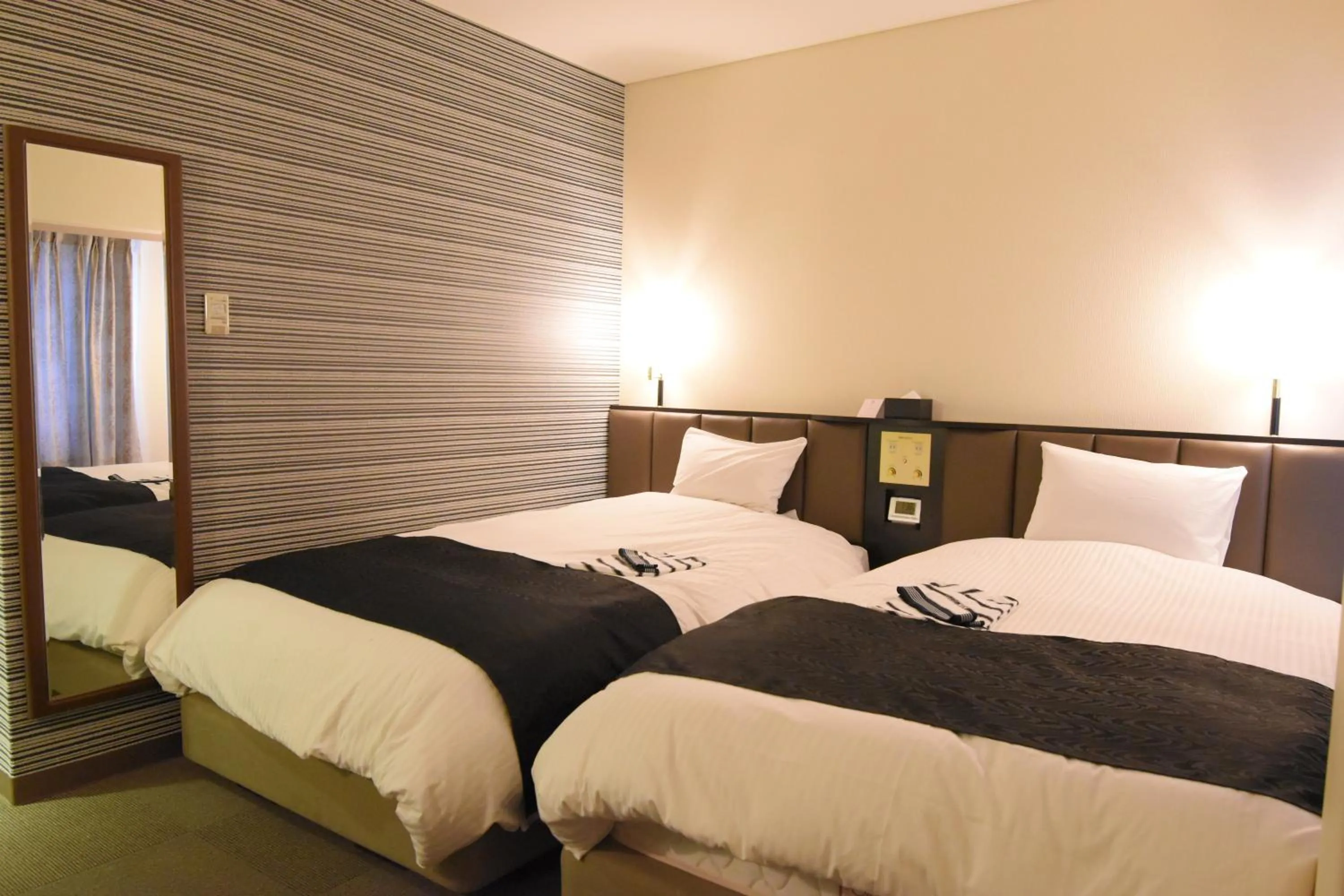 Bedroom in Apa Hotel Owari Ichinomiya Eki-Mae