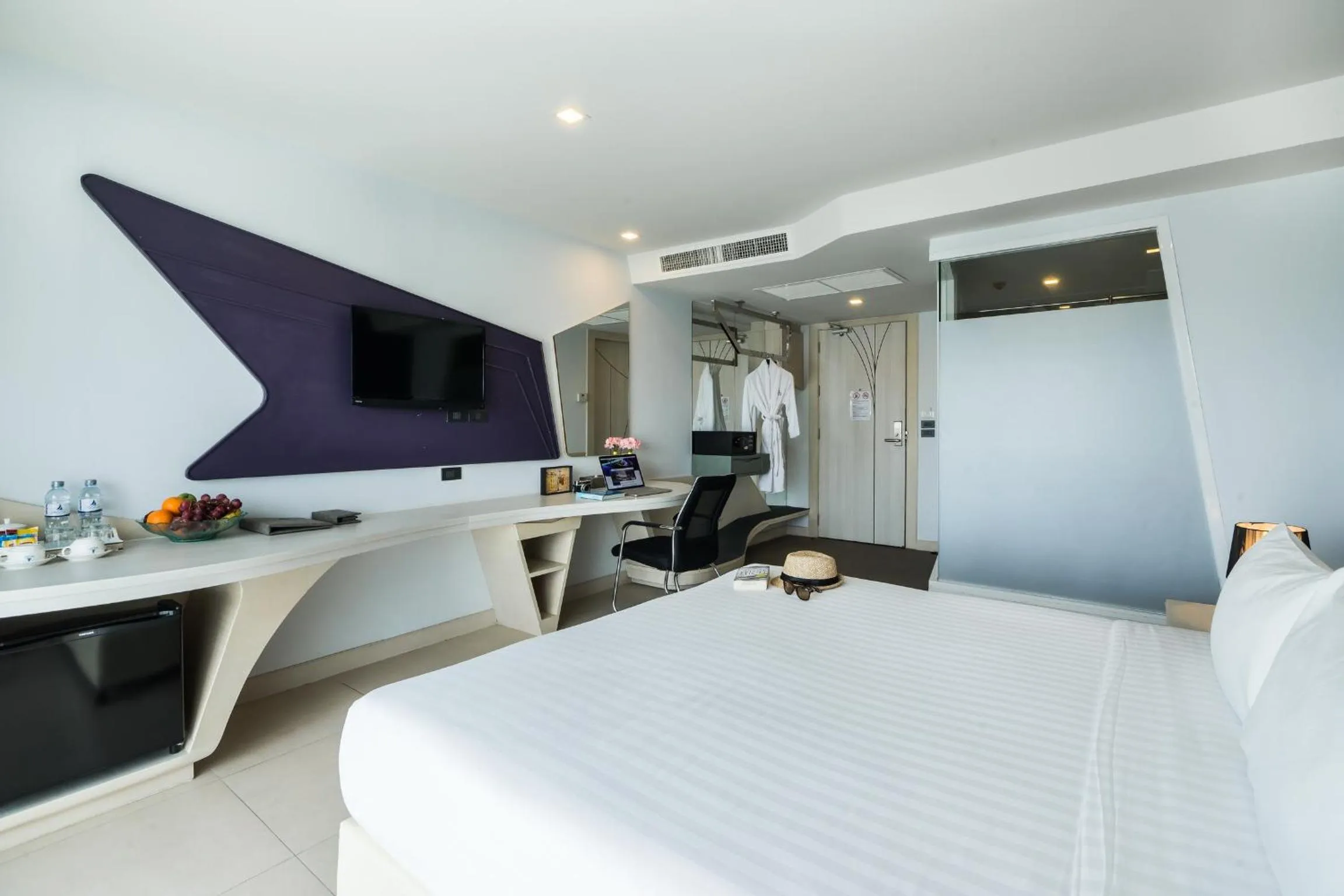 Bed in Blue Boat Hotel JC