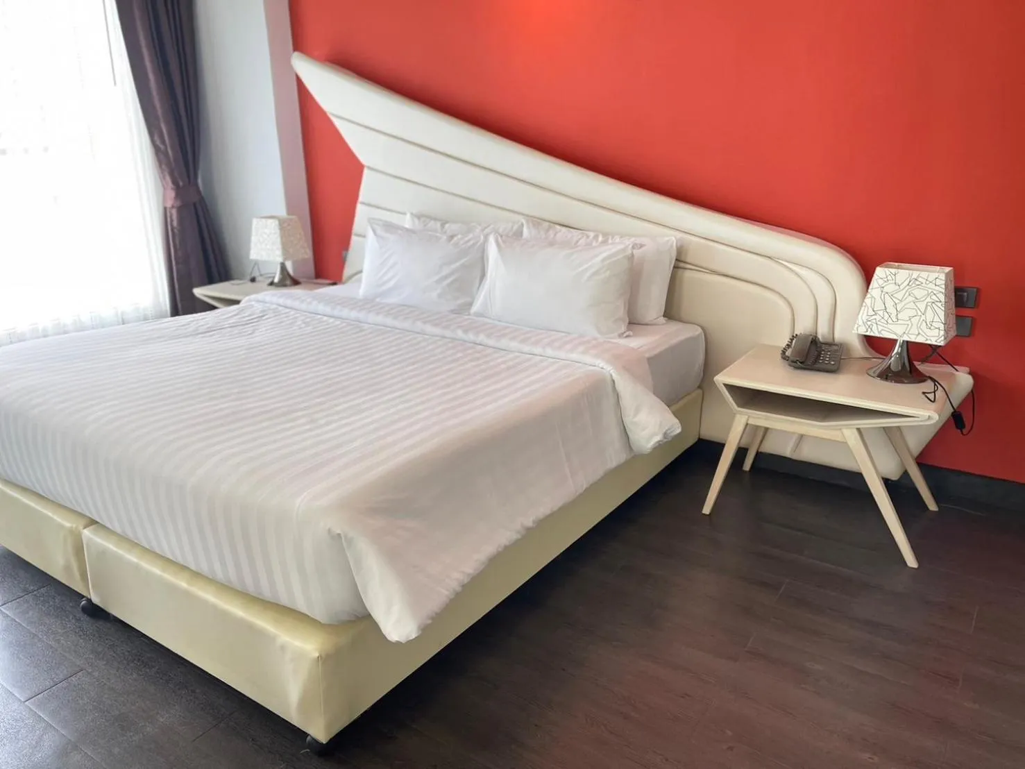 Bed in Blue Boat Hotel JC