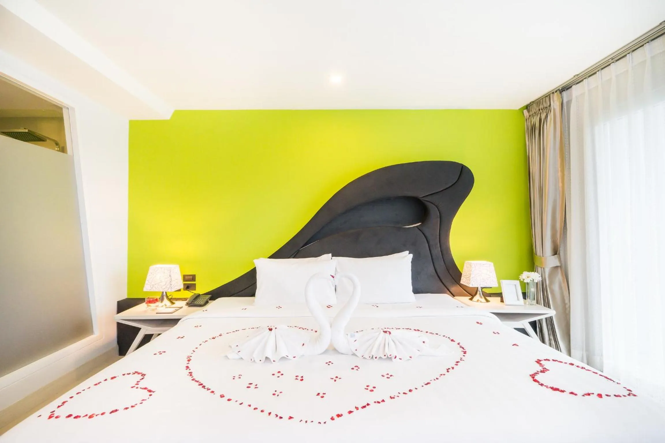 Bed in Blue Boat Hotel JC