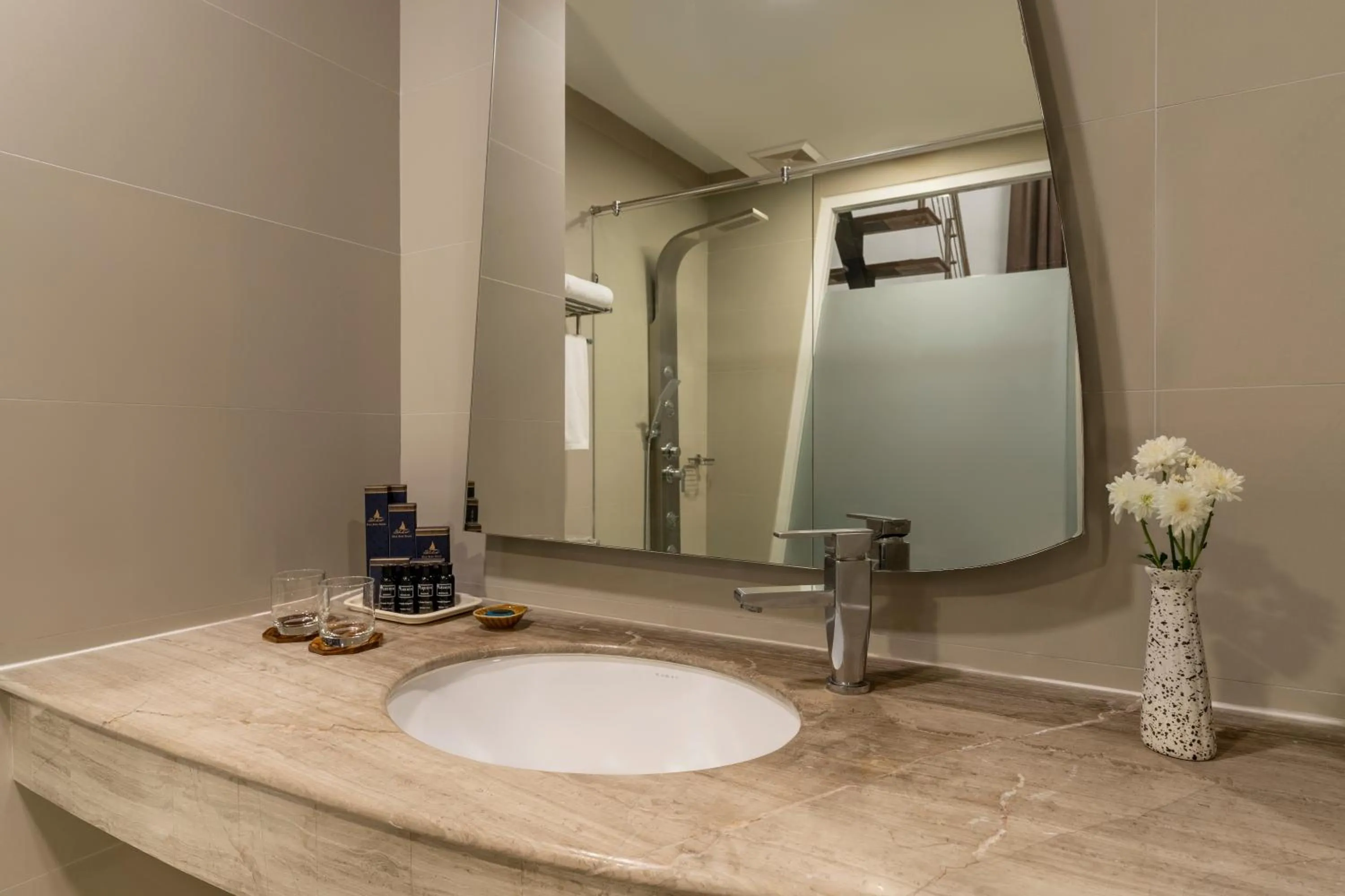 Bathroom in Blue Boat Hotel JC