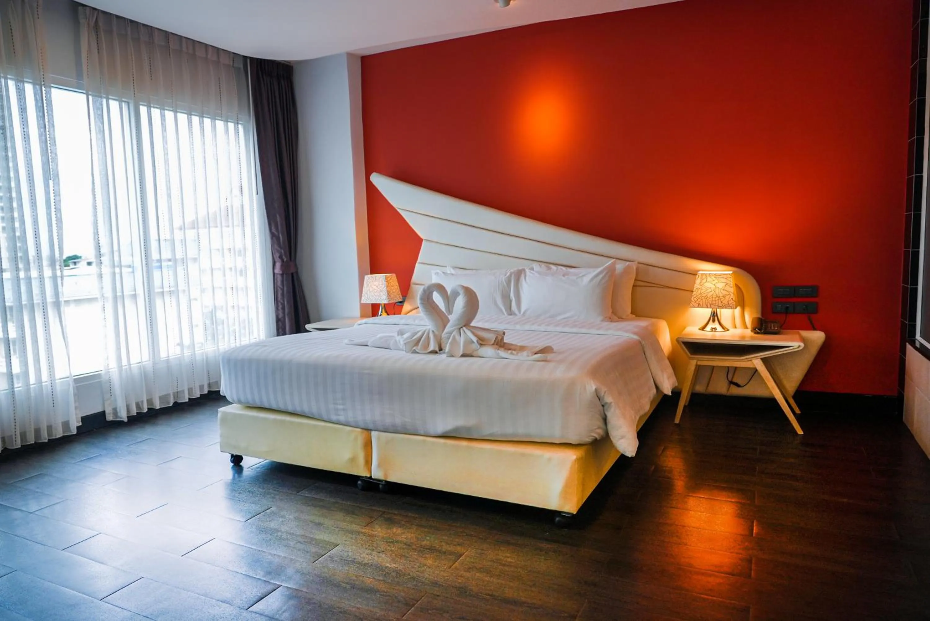 Bed in Blue Boat Hotel JC