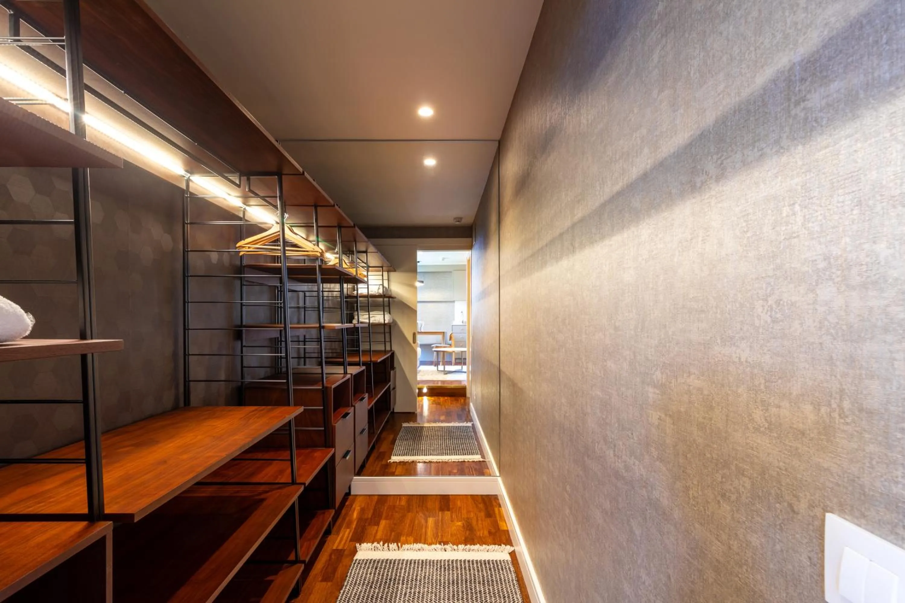 wardrobe in Duquesa Suites Landmark Hotel by Grup Duquessa