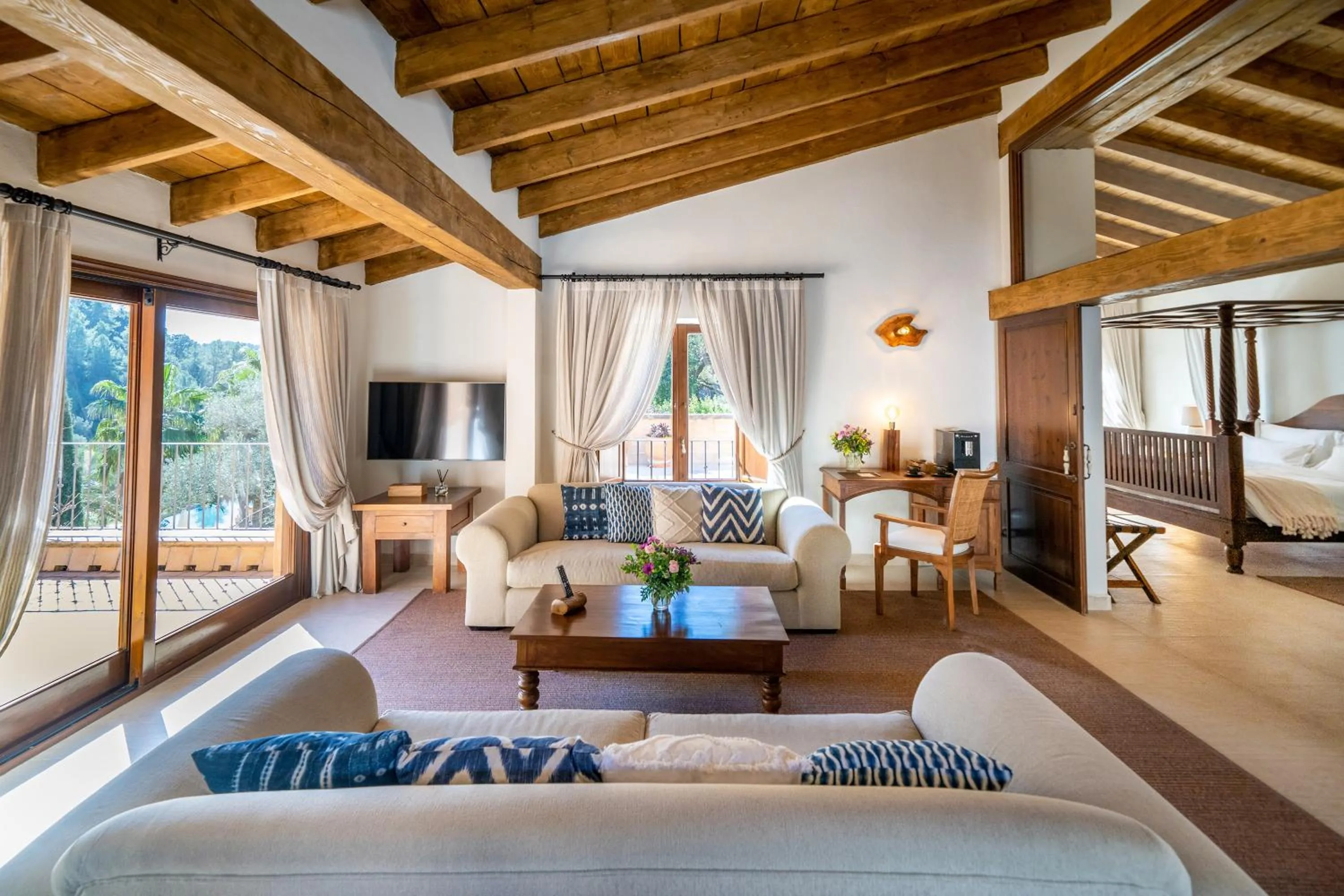 Living room, Bed in Finca Ratxo Hotel, member of Melia Collection