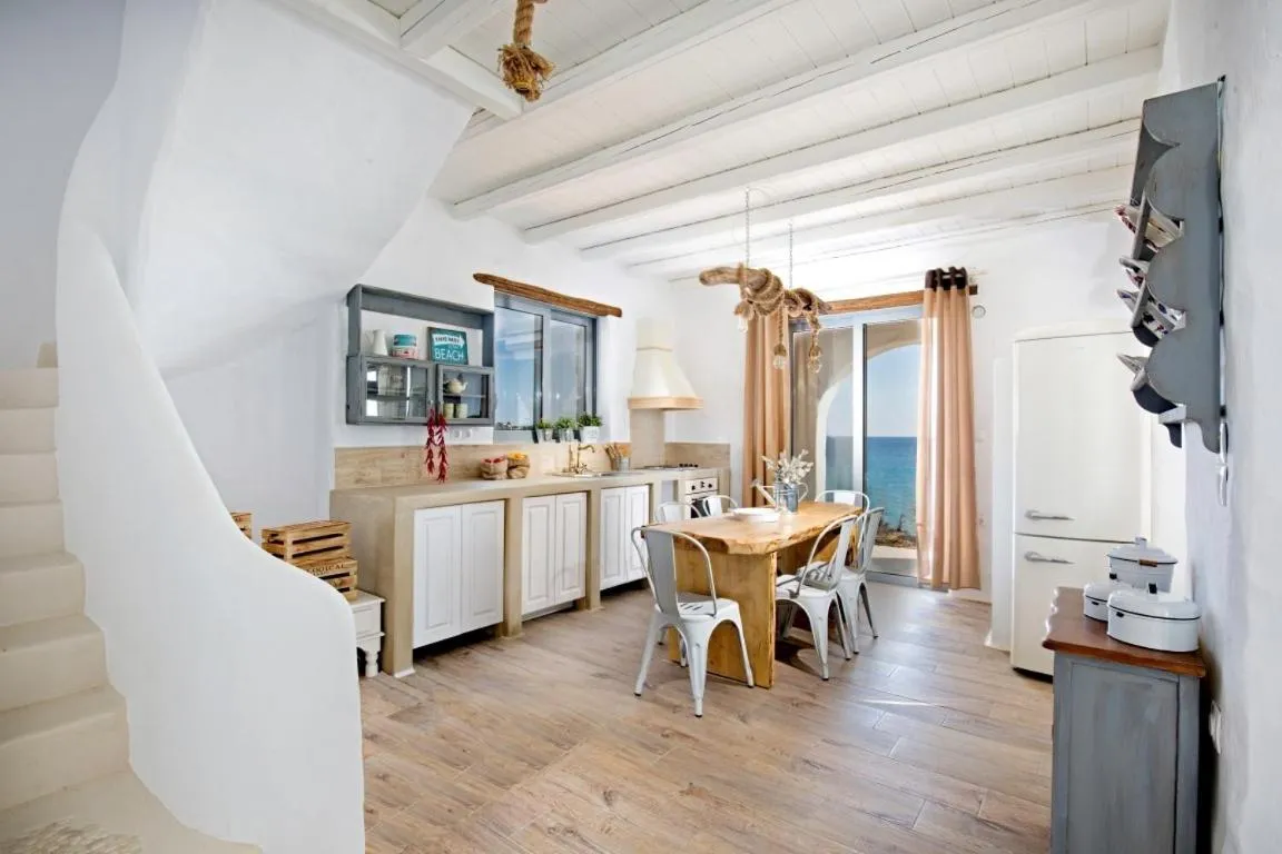Kitchen or kitchenette in Axiotheaton Villas