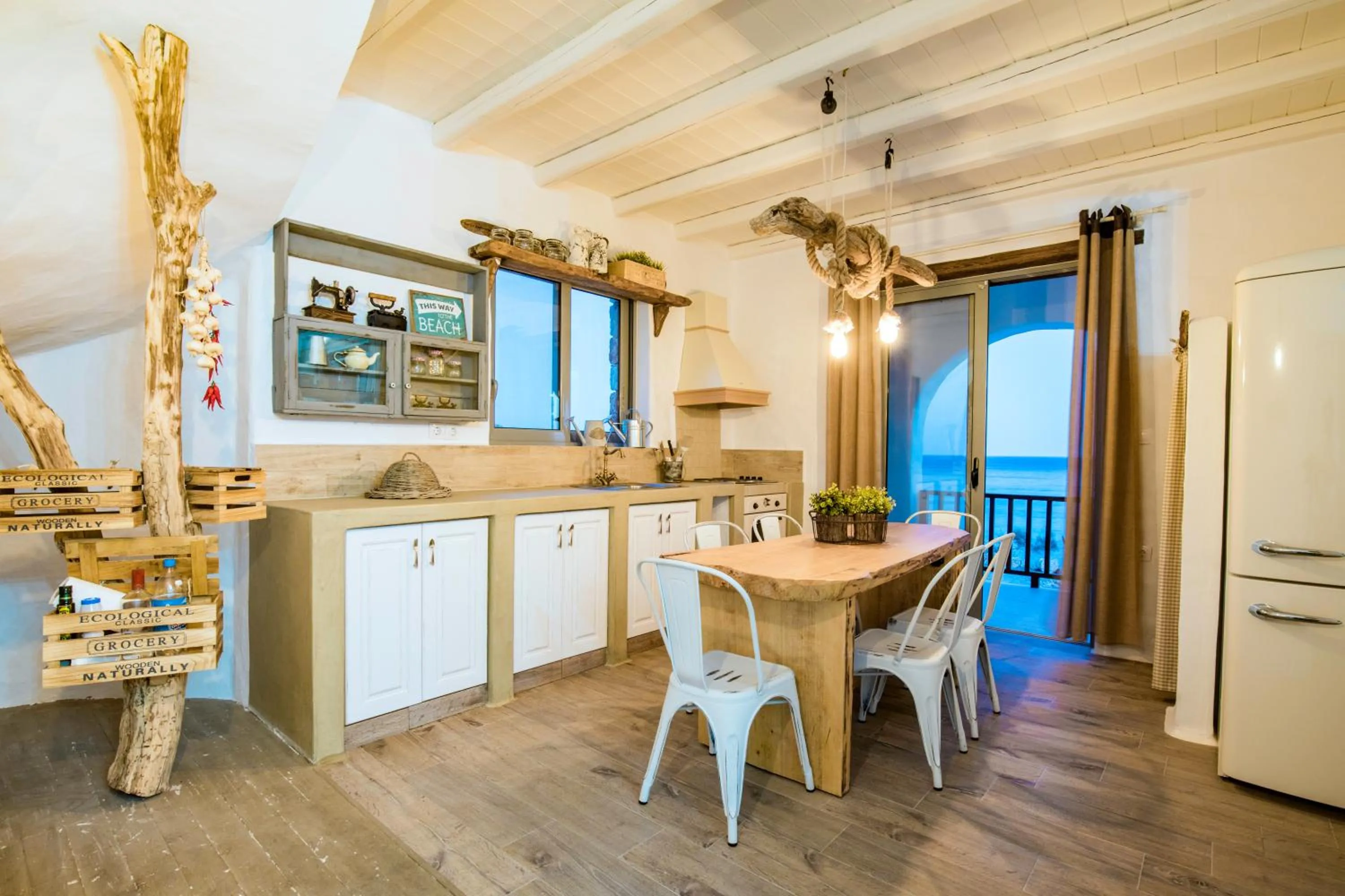 Kitchen or kitchenette in Axiotheaton Villas