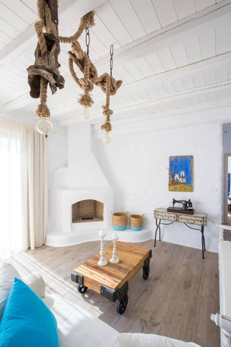 Living room, Bed in Axiotheaton Villas