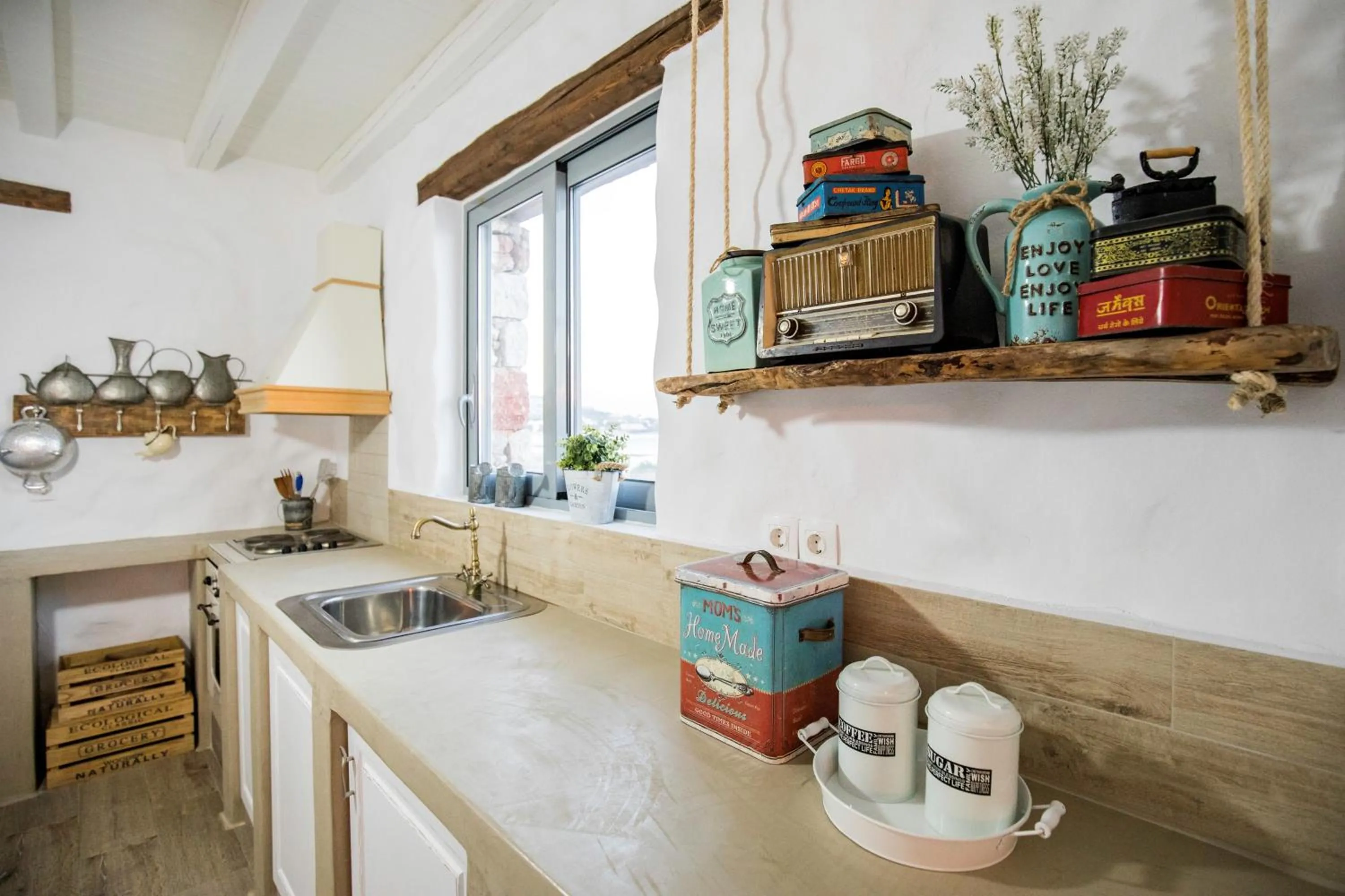 Kitchen or kitchenette in Axiotheaton Villas