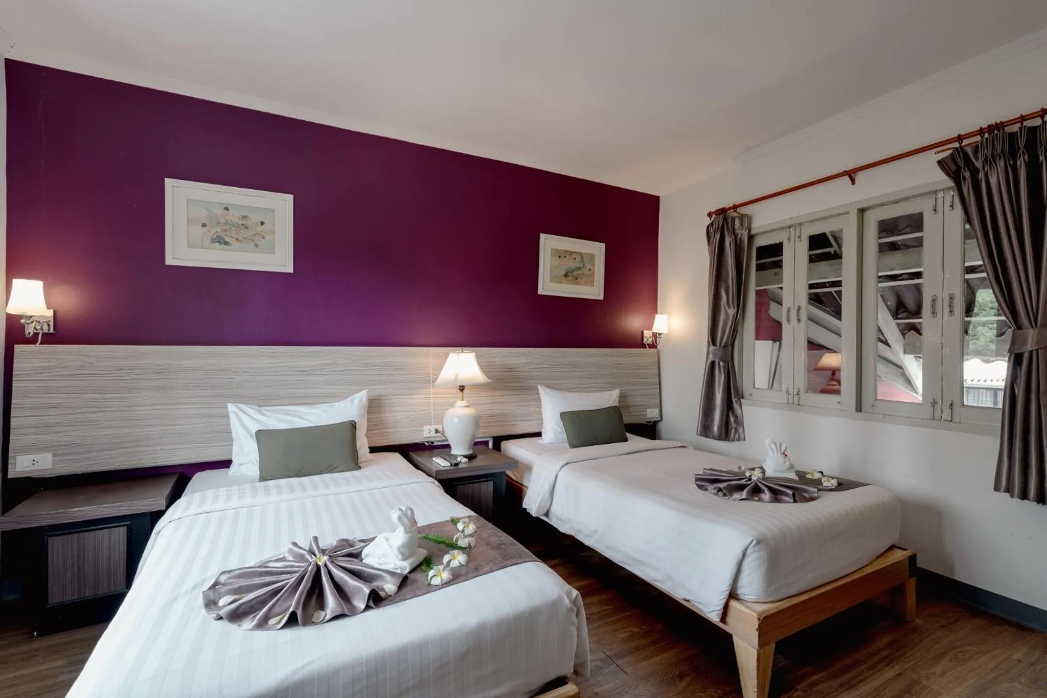 Bed in Natural Park Resort Pattaya