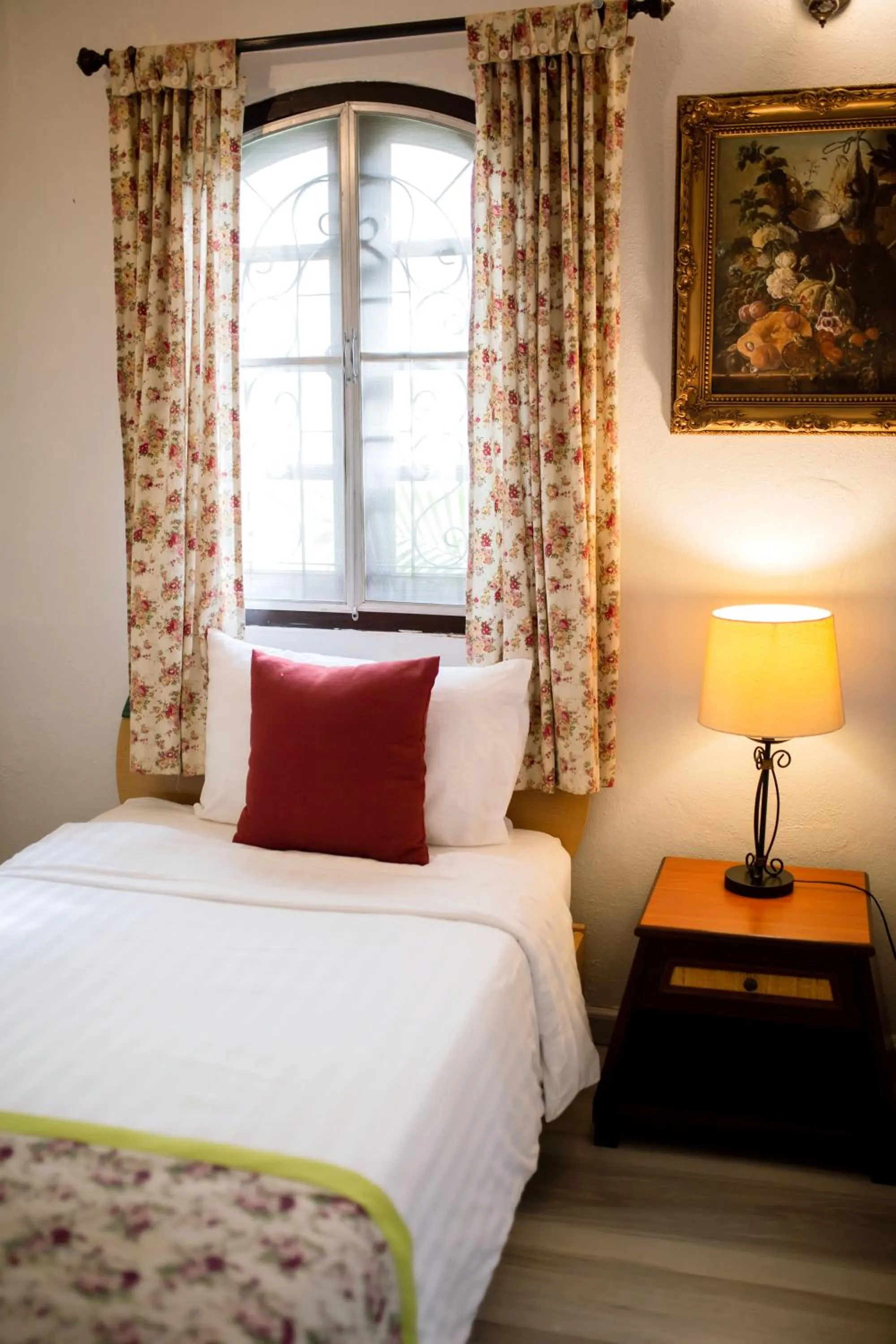 Bed in Natural Park Resort Pattaya