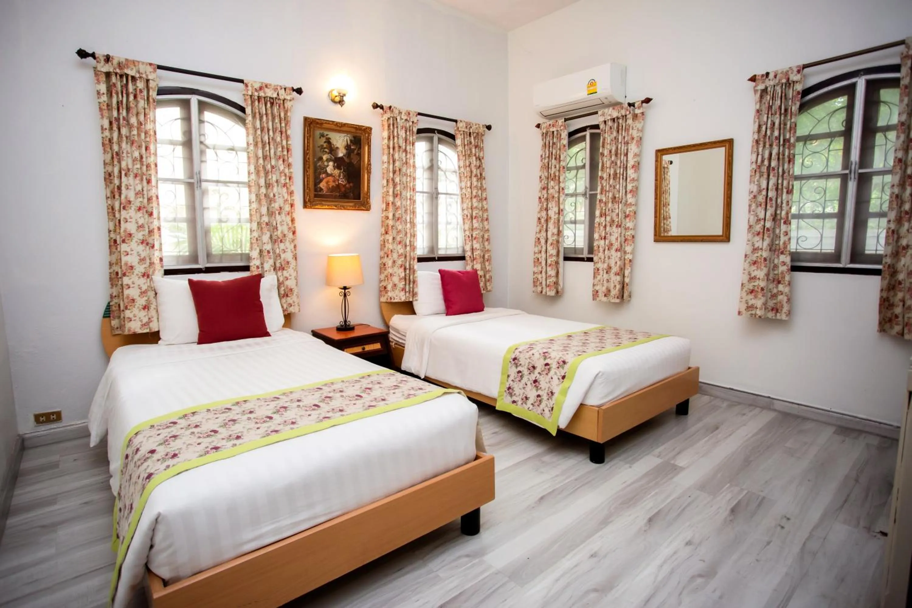 Bed in Natural Park Resort Pattaya