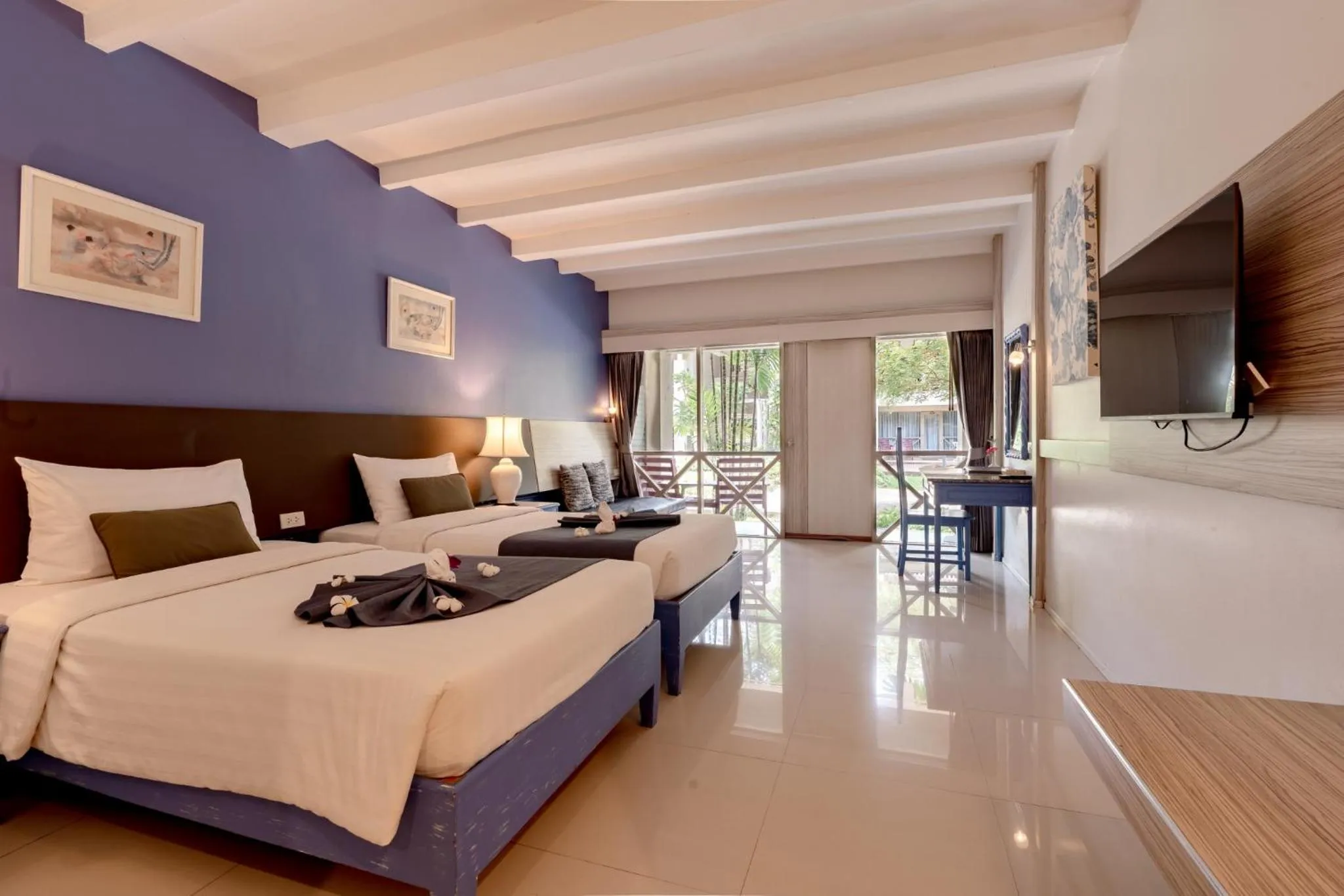 Bed in Natural Park Resort Pattaya