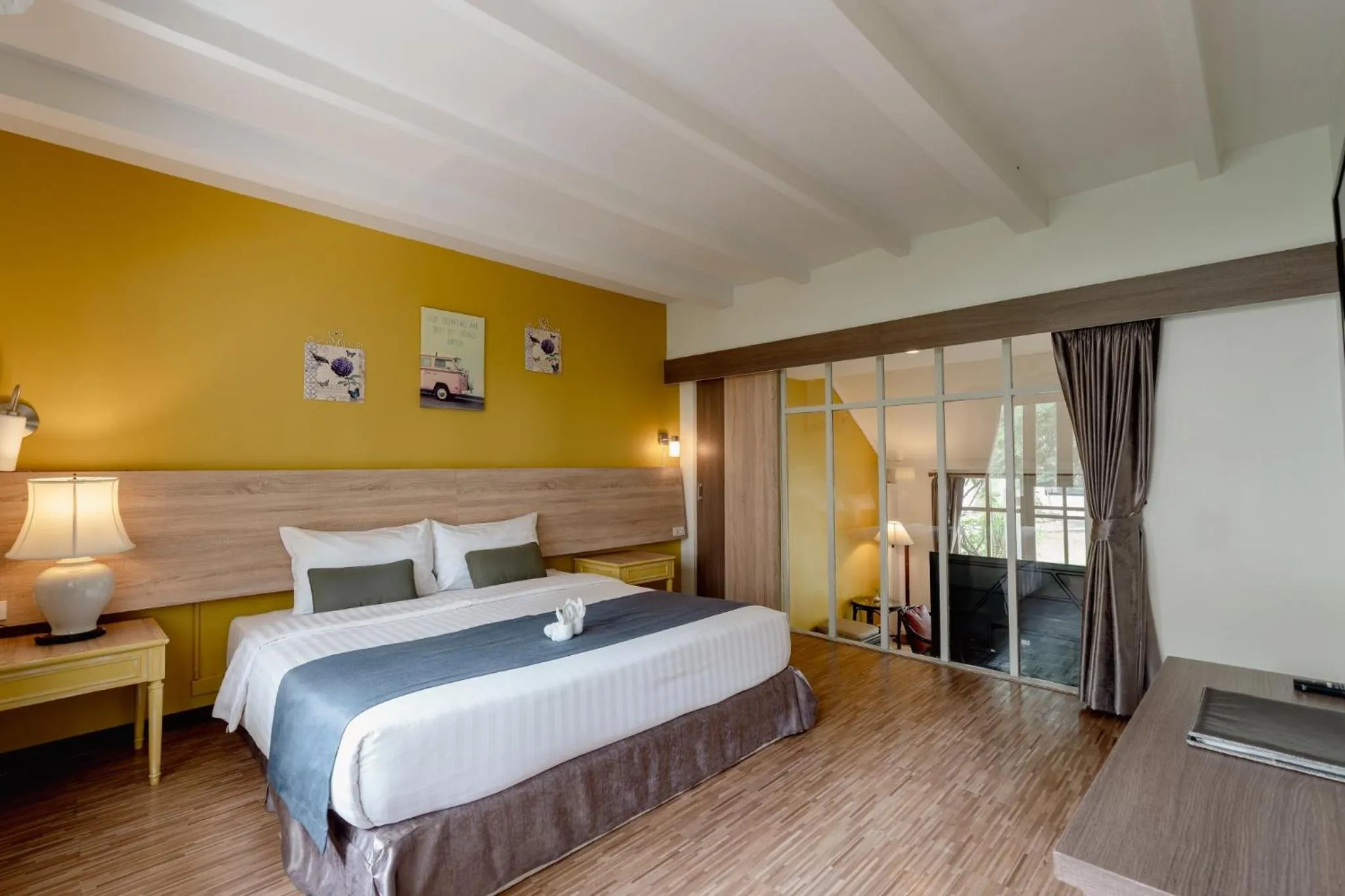 Bed in Natural Park Resort Pattaya