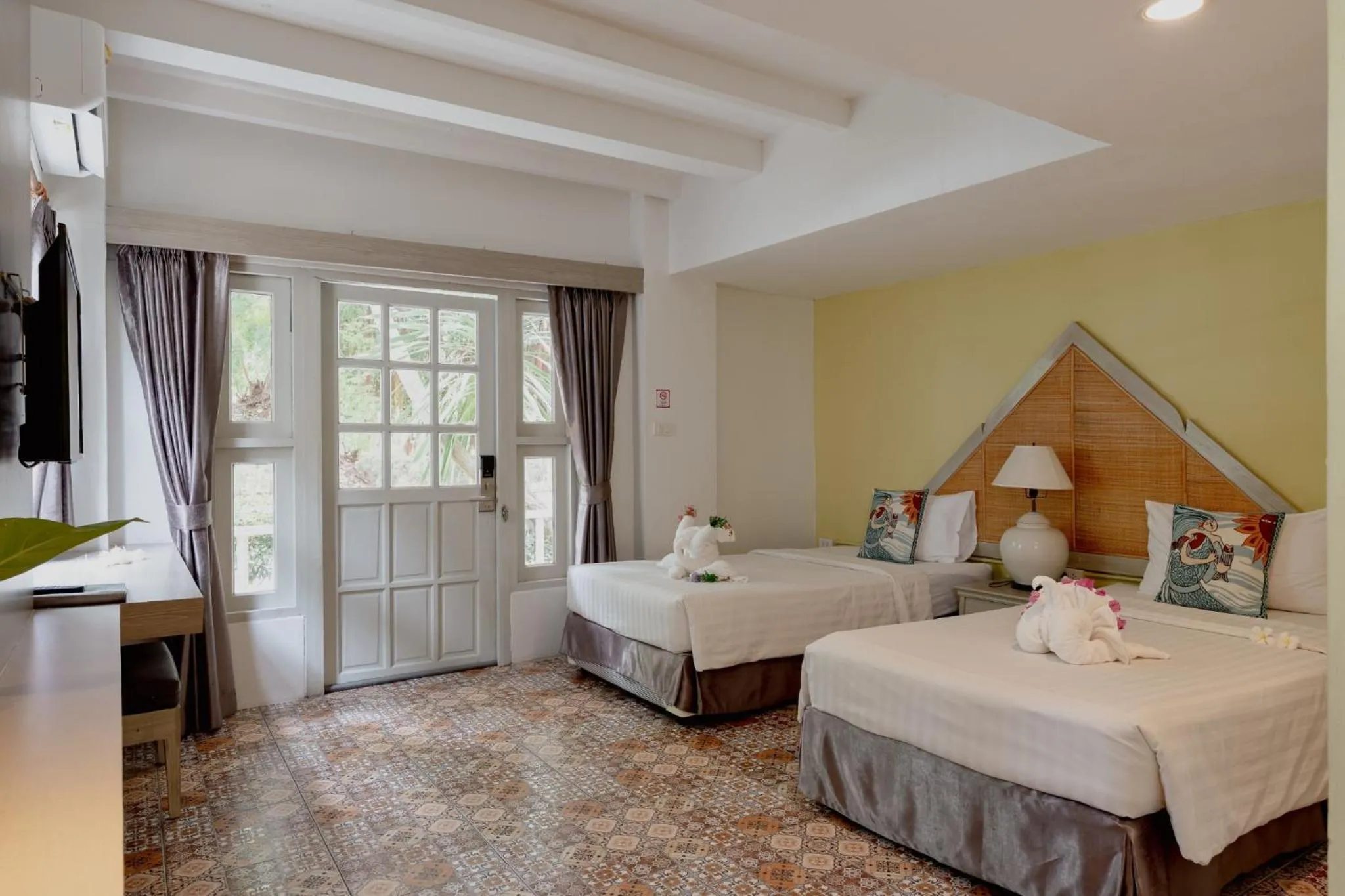 Bed in Natural Park Resort Pattaya