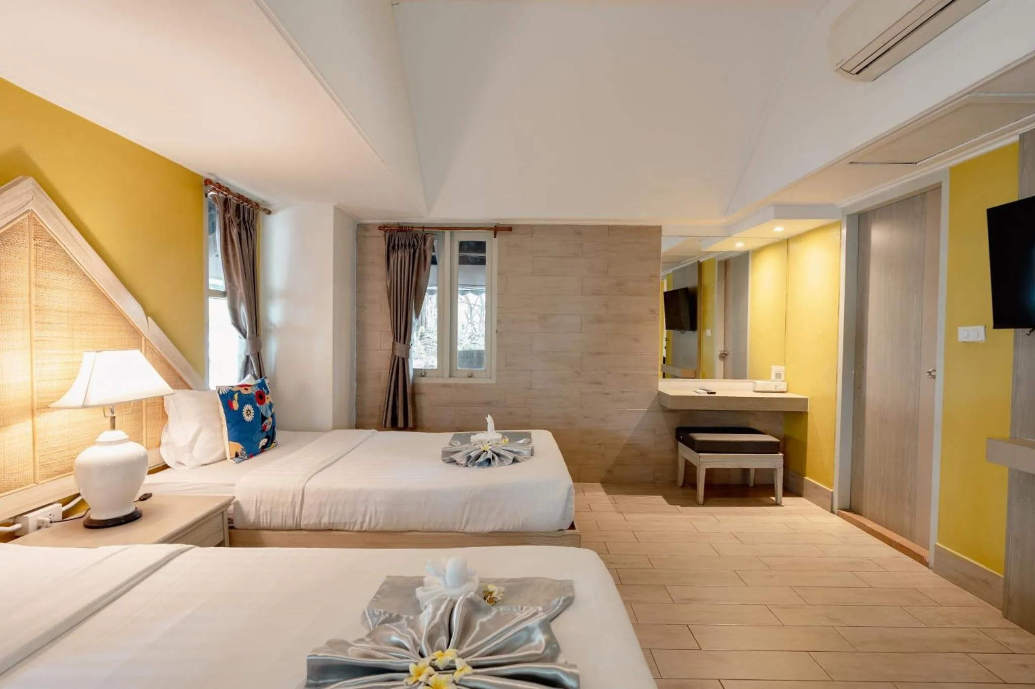 Bed in Natural Park Resort Pattaya