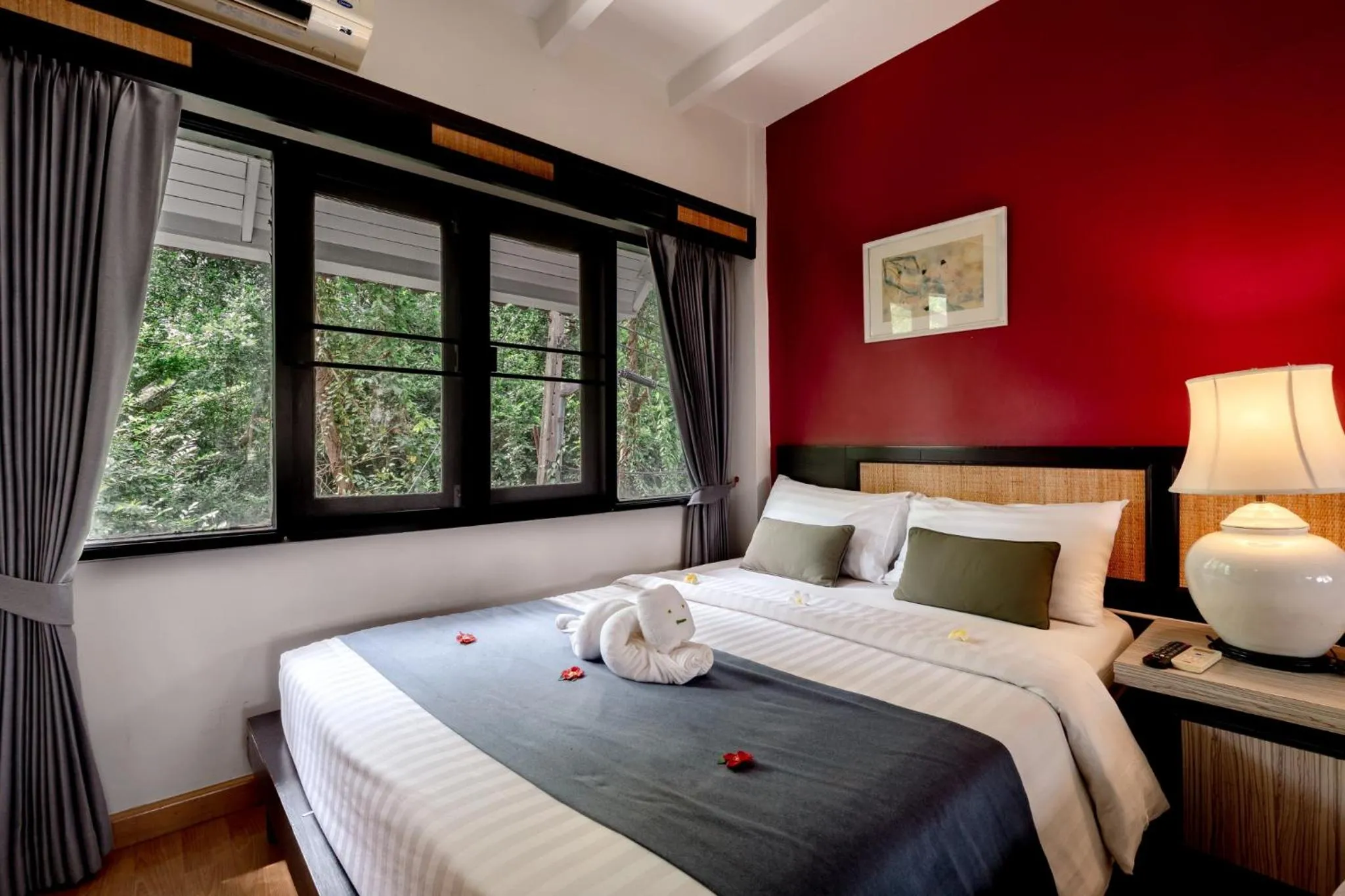 Bed in Natural Park Resort Pattaya