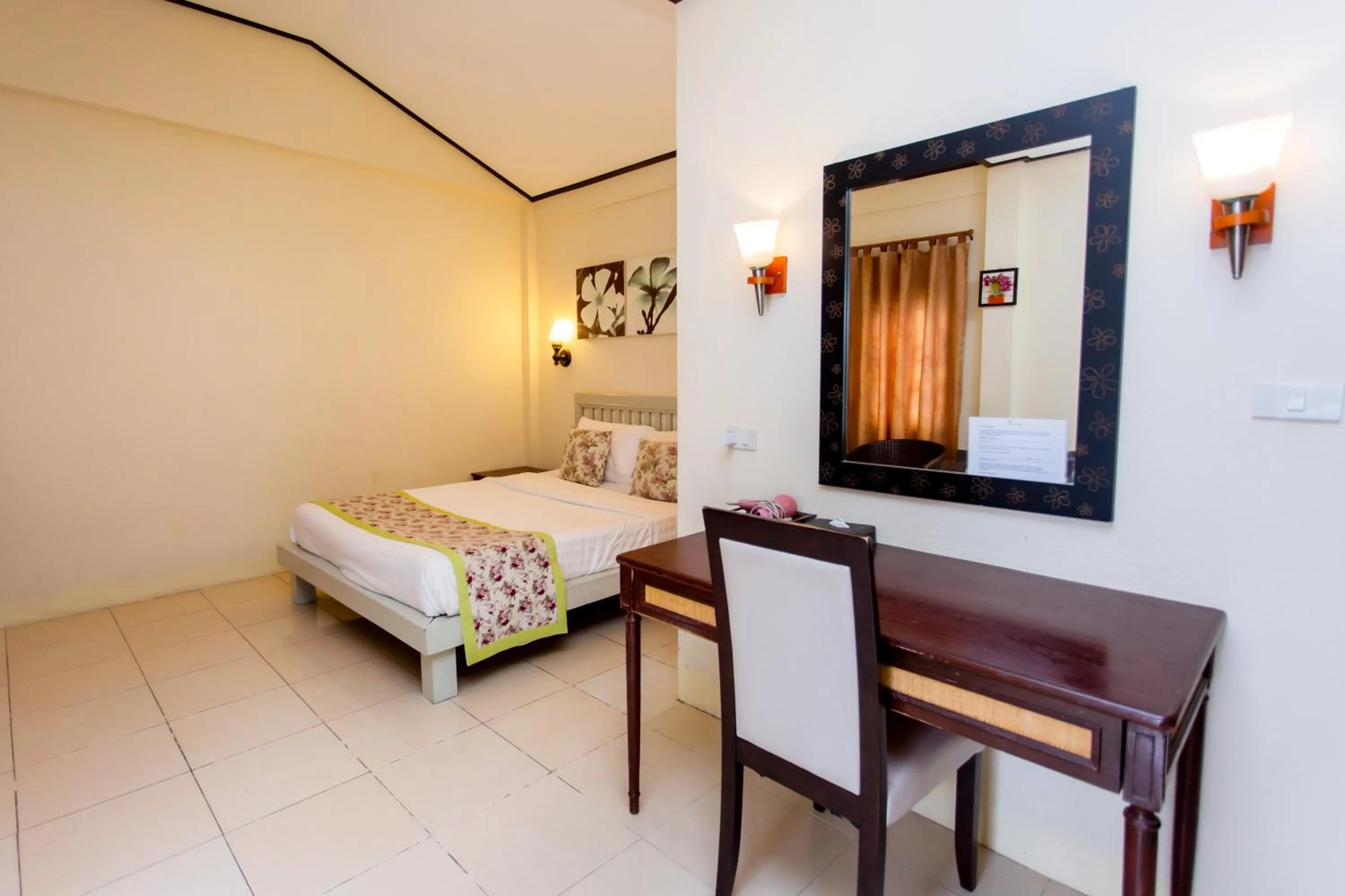 Bed in Natural Park Resort Pattaya