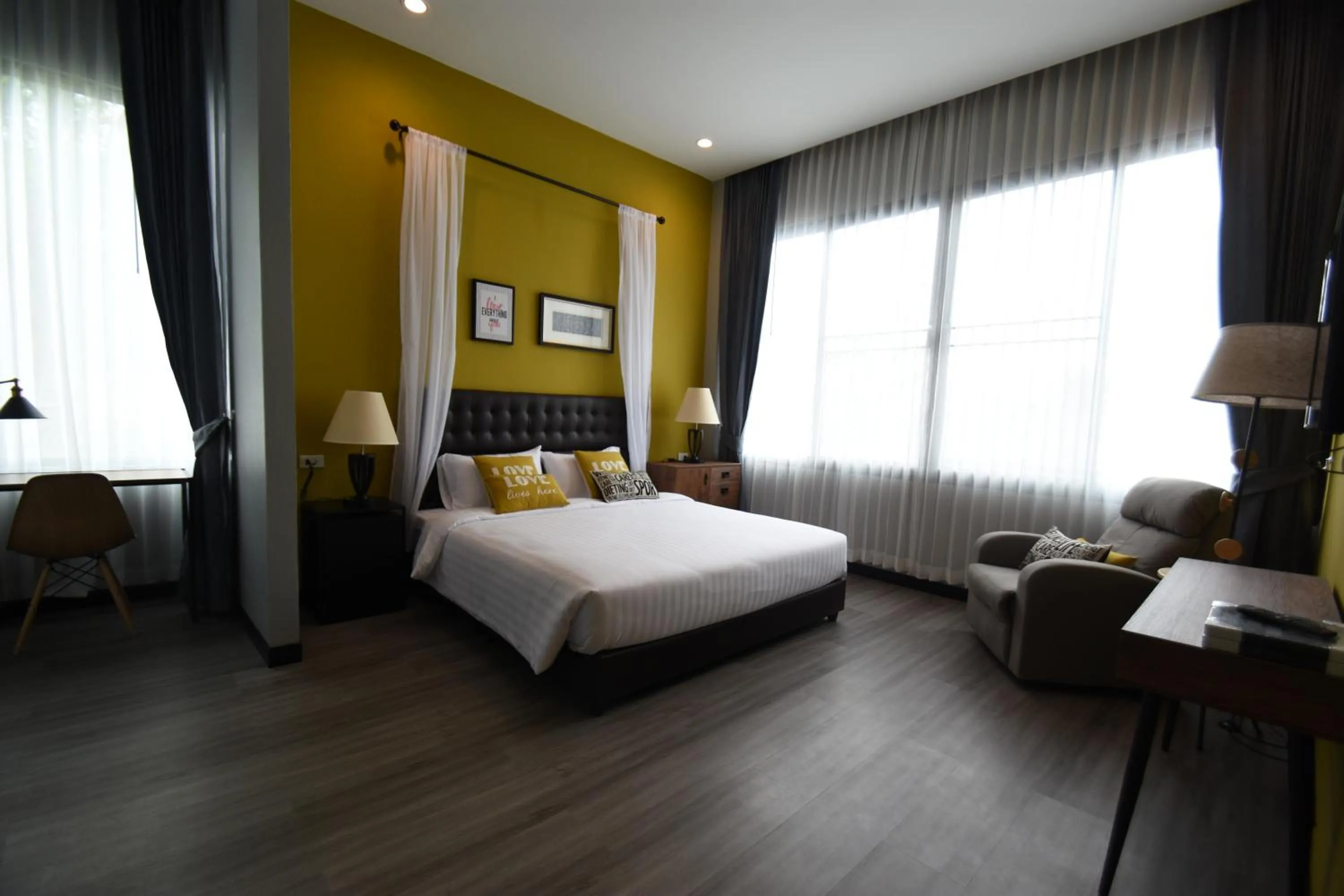 Bed in Natural Park Resort Pattaya