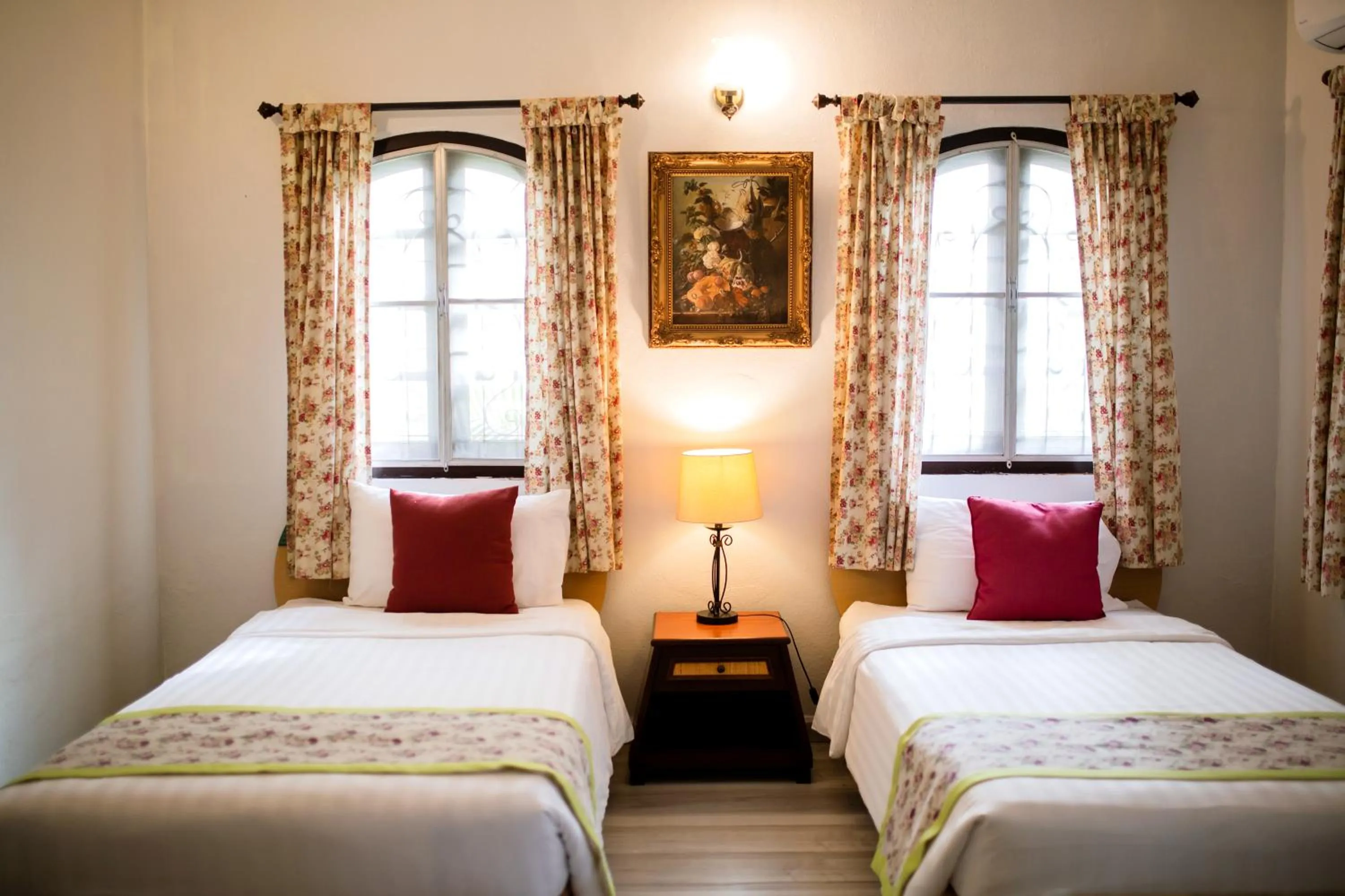 Bed in Natural Park Resort Pattaya