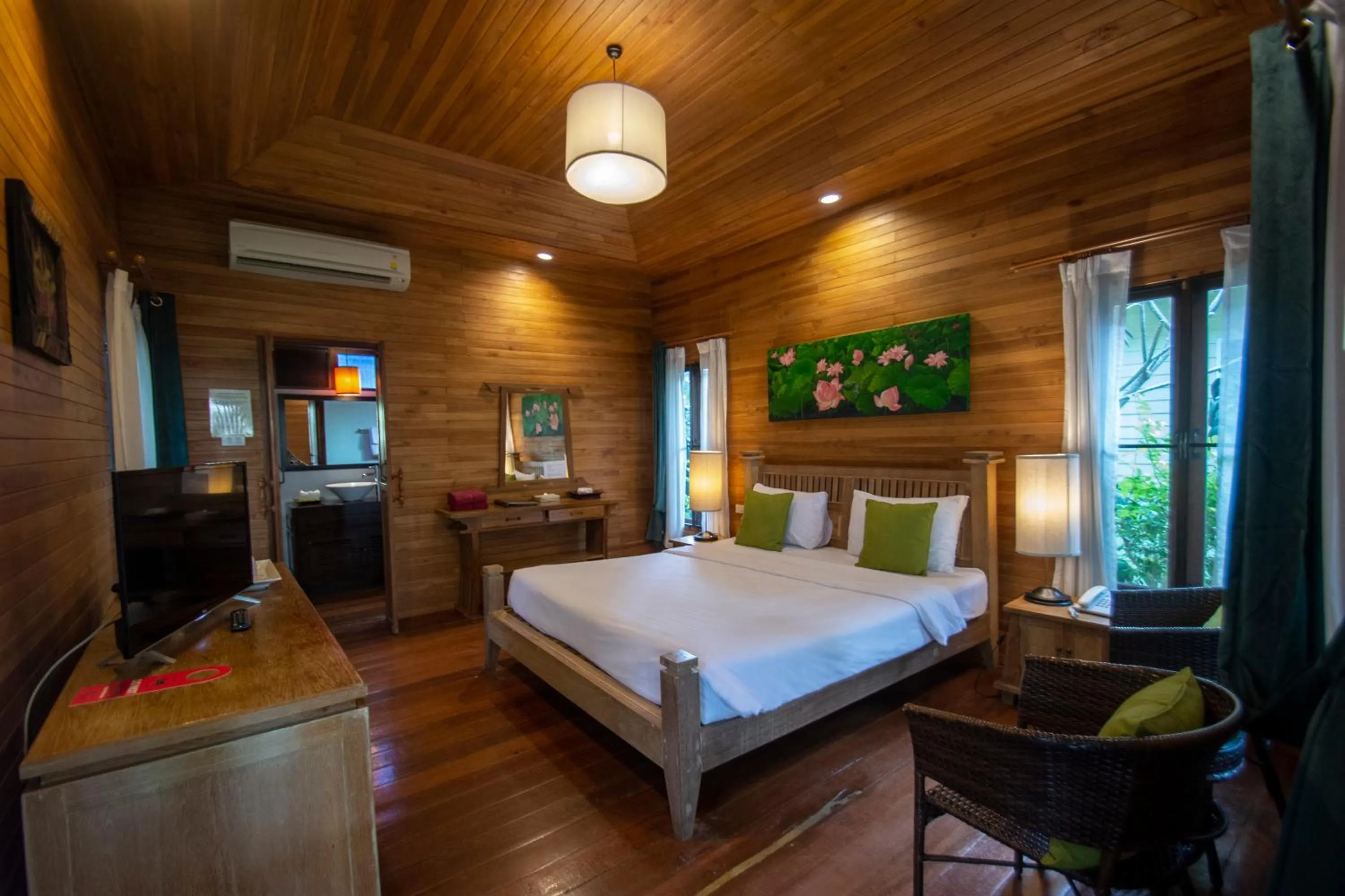 Bed in Natural Park Resort Pattaya