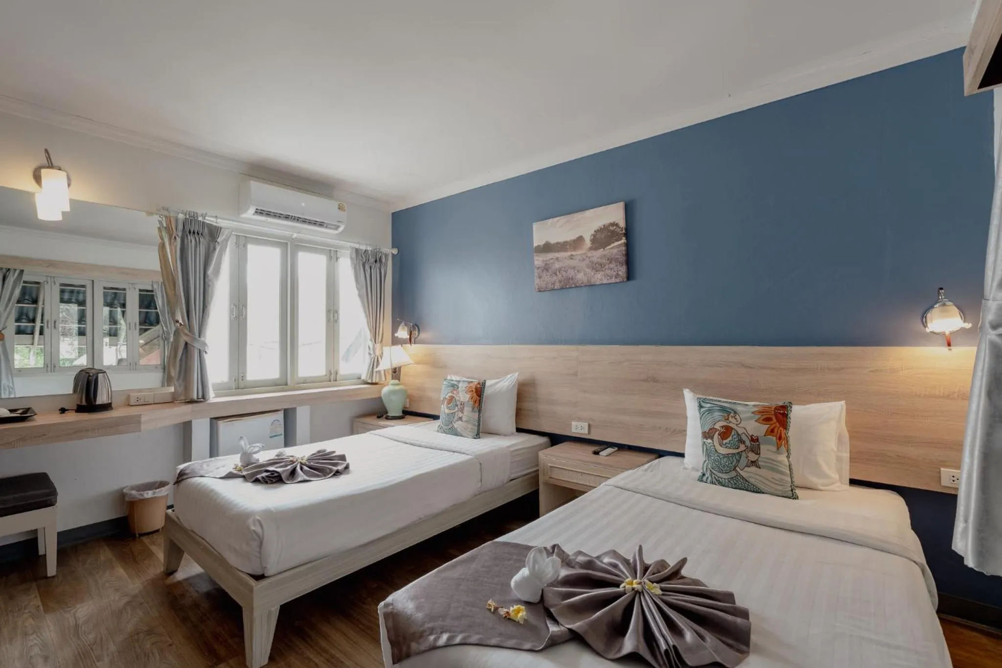 Bed in Natural Park Resort Pattaya