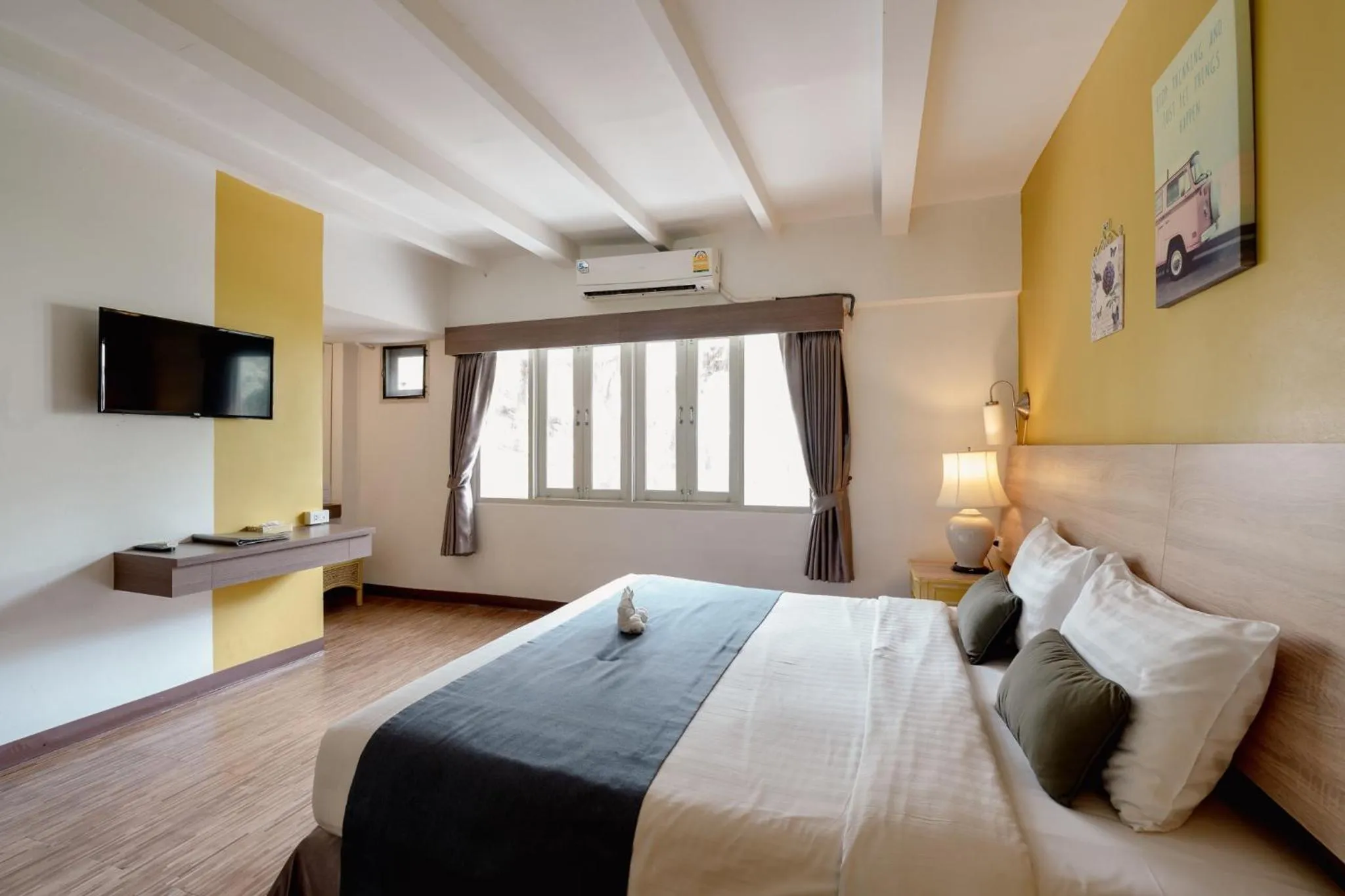 Bed in Natural Park Resort Pattaya