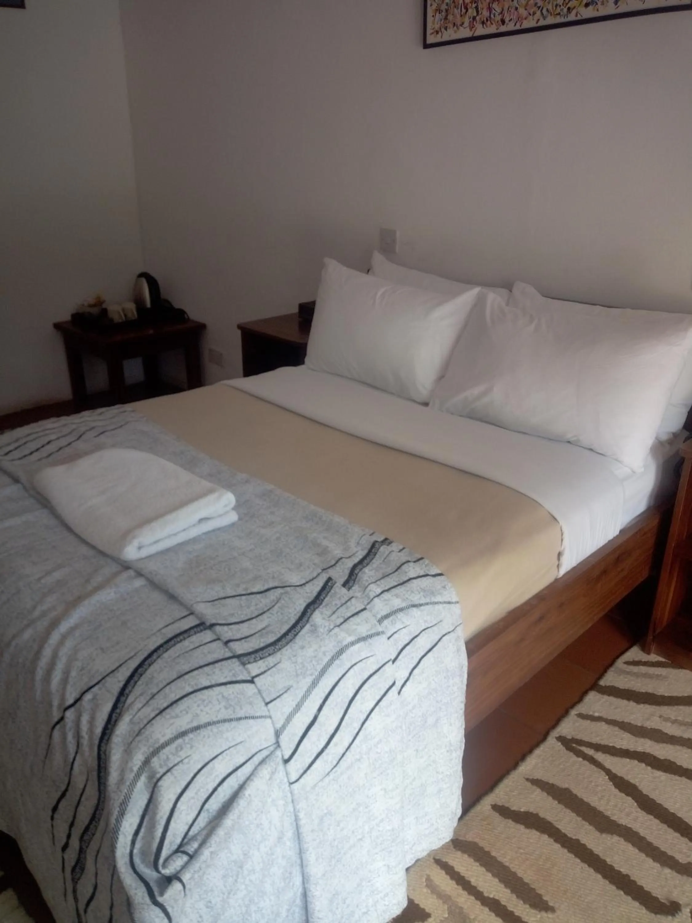 Bed in Chaminuka Lodge