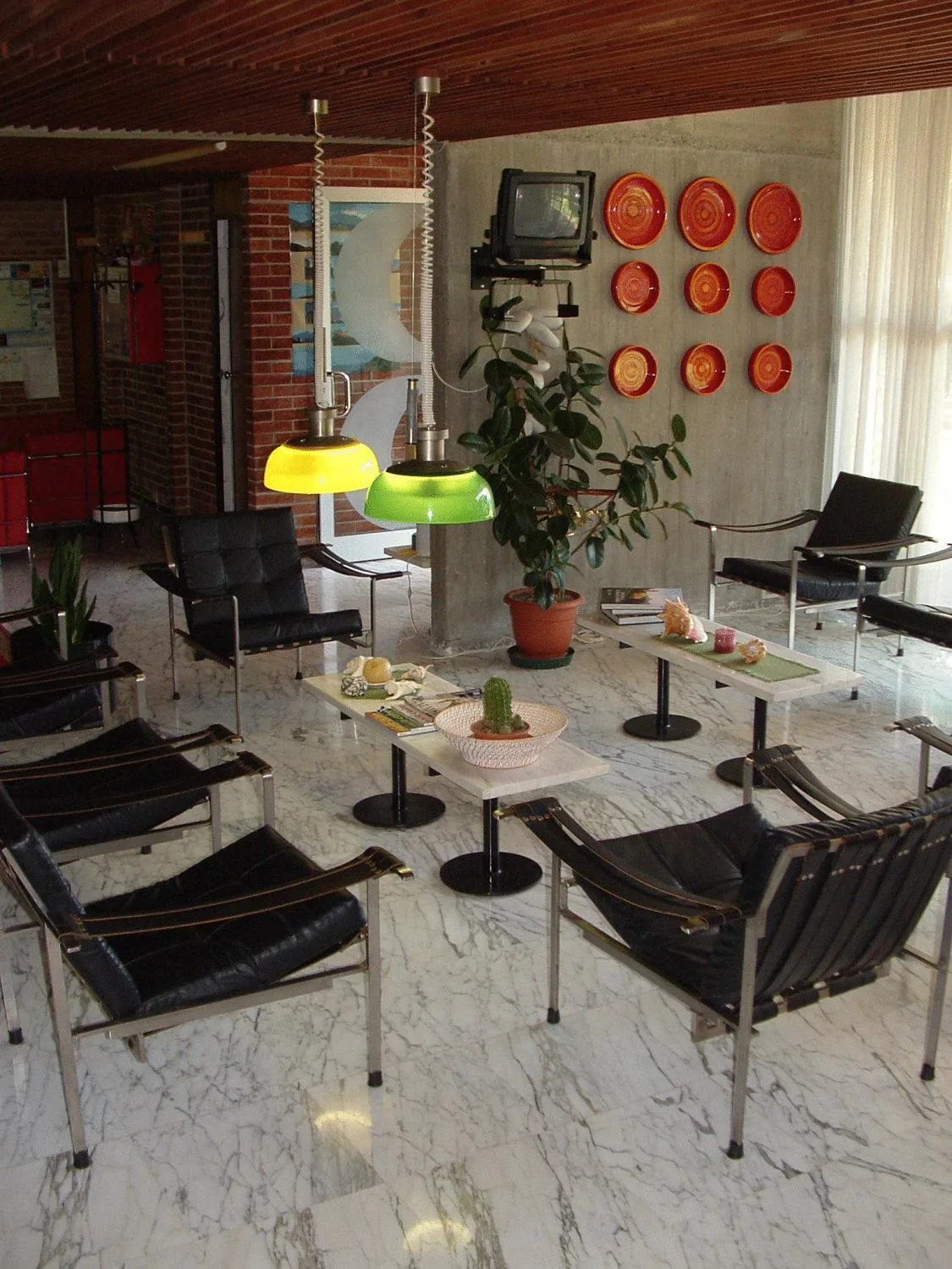 Communal lounge/ TV room in Hotel Marina