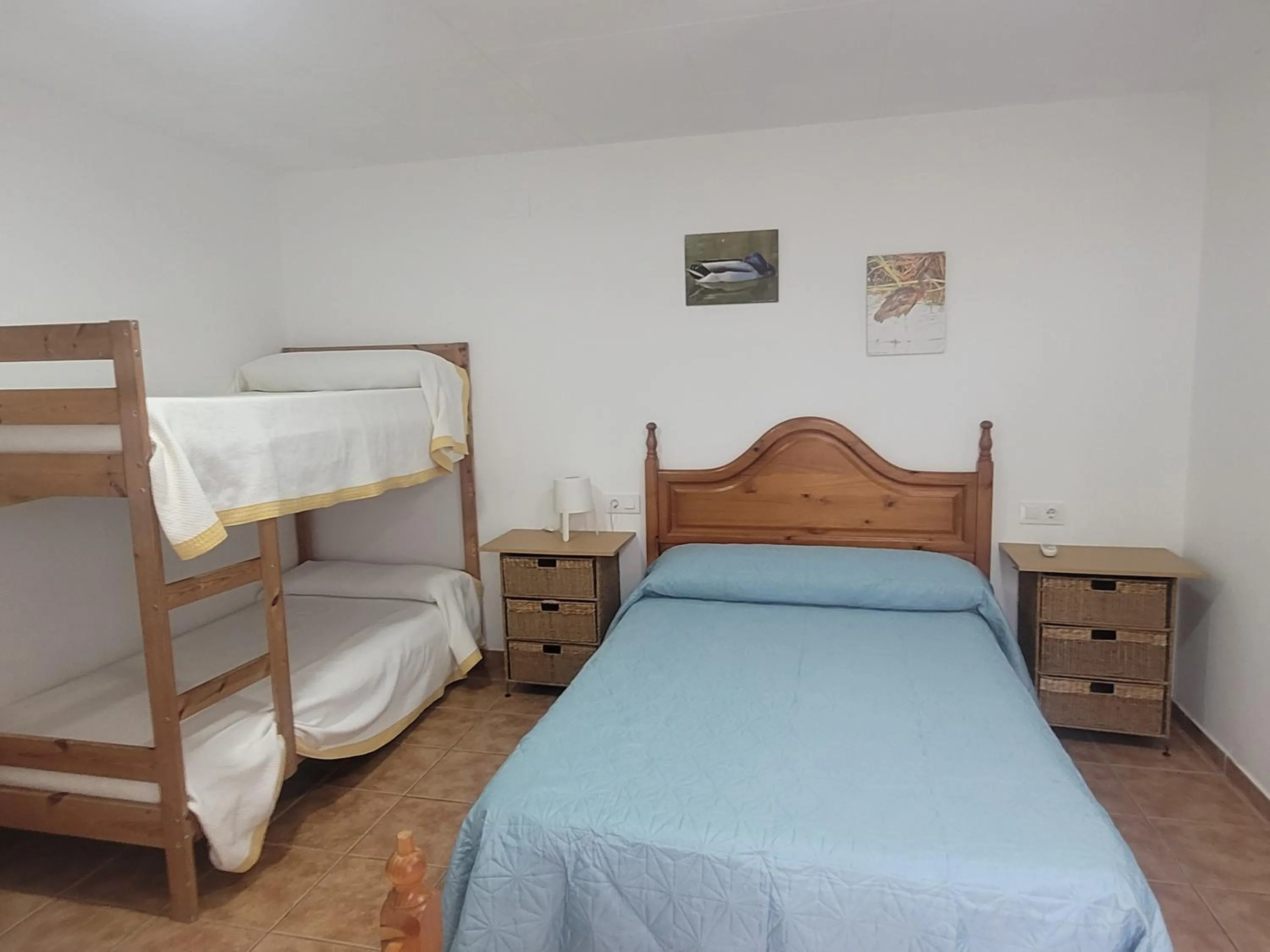 Photo of the whole room, Bed in La Llar de Laura