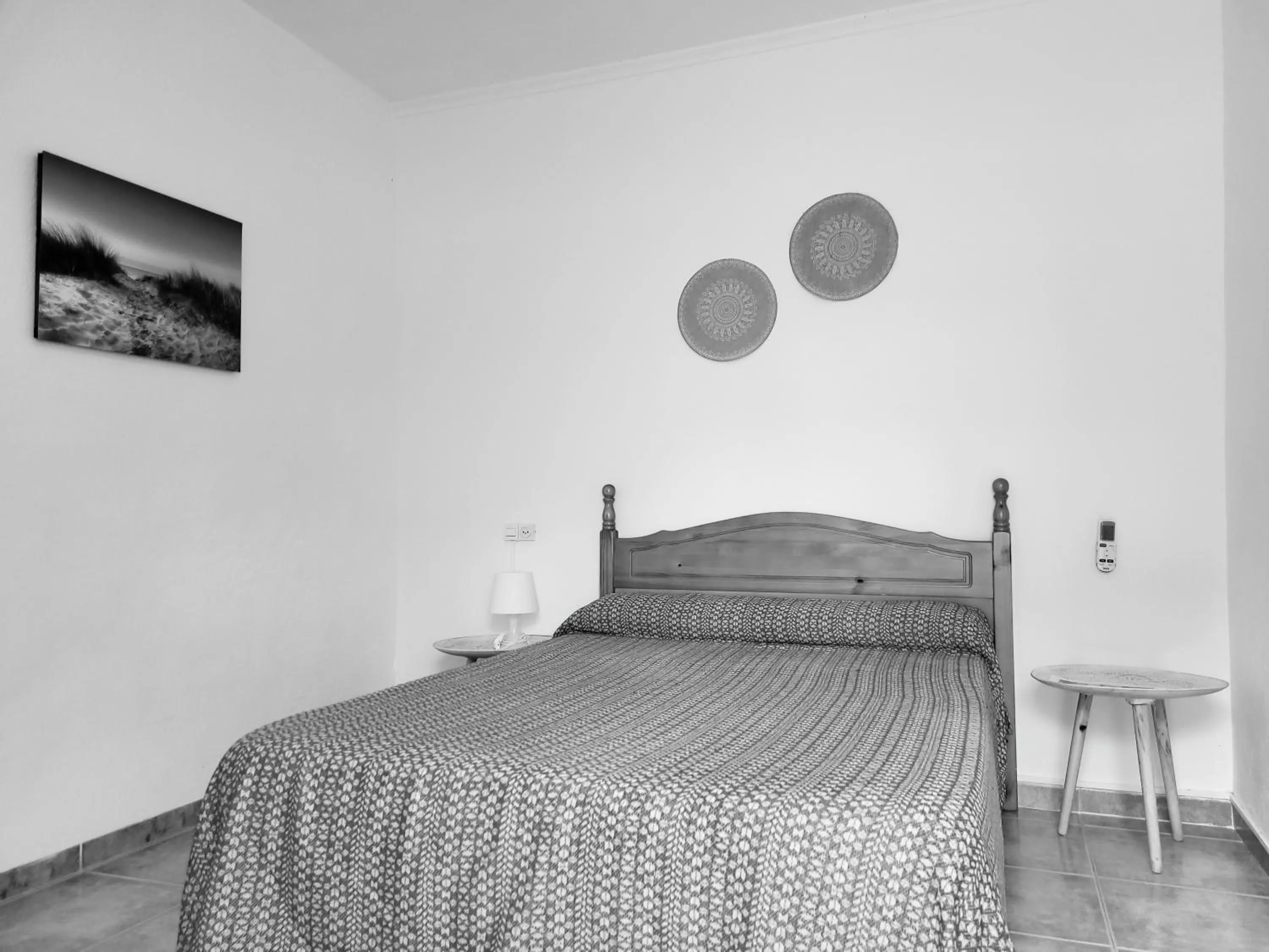 Photo of the whole room, Bed in La Llar de Laura