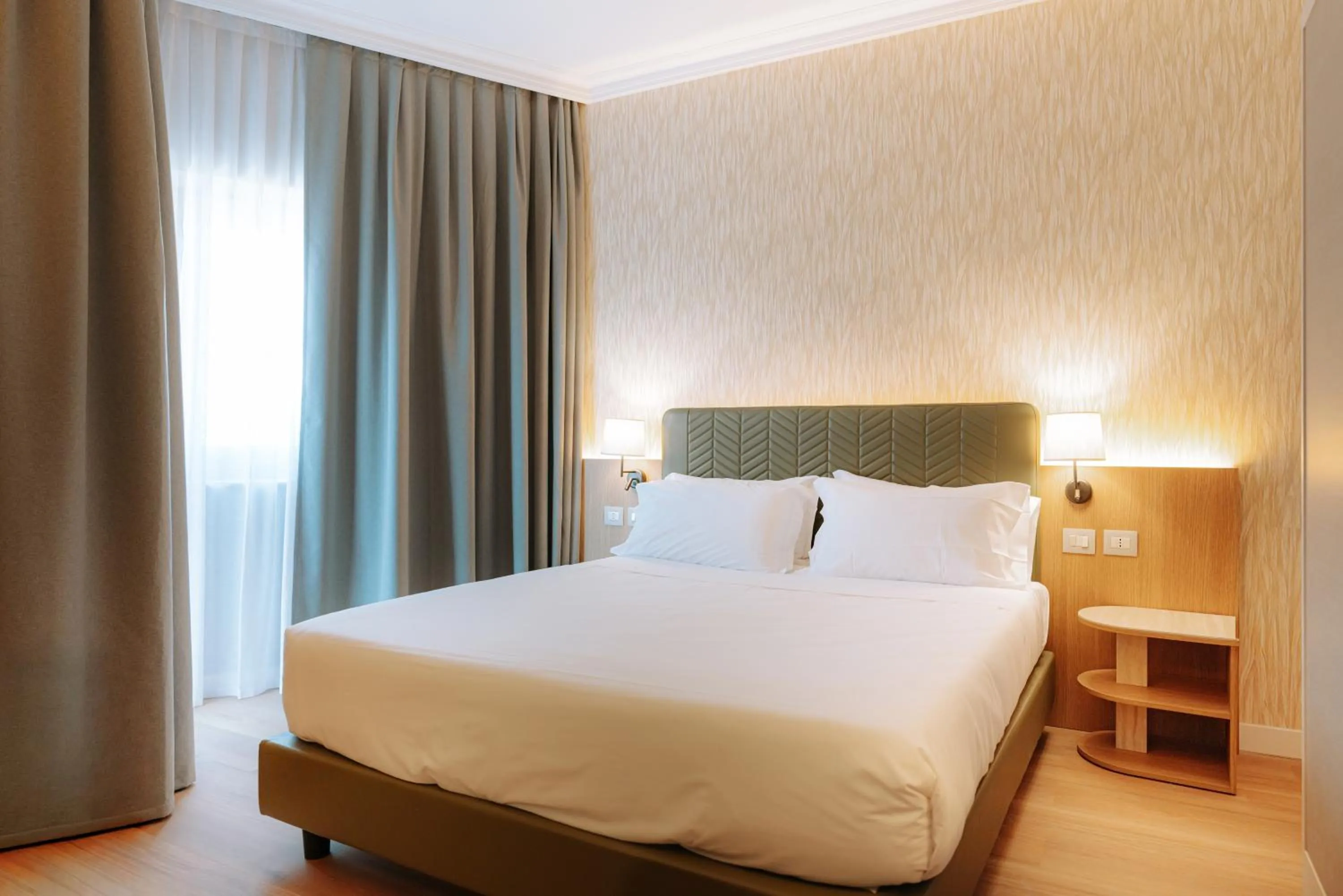 Bed in Mövenpick Hotel Bari