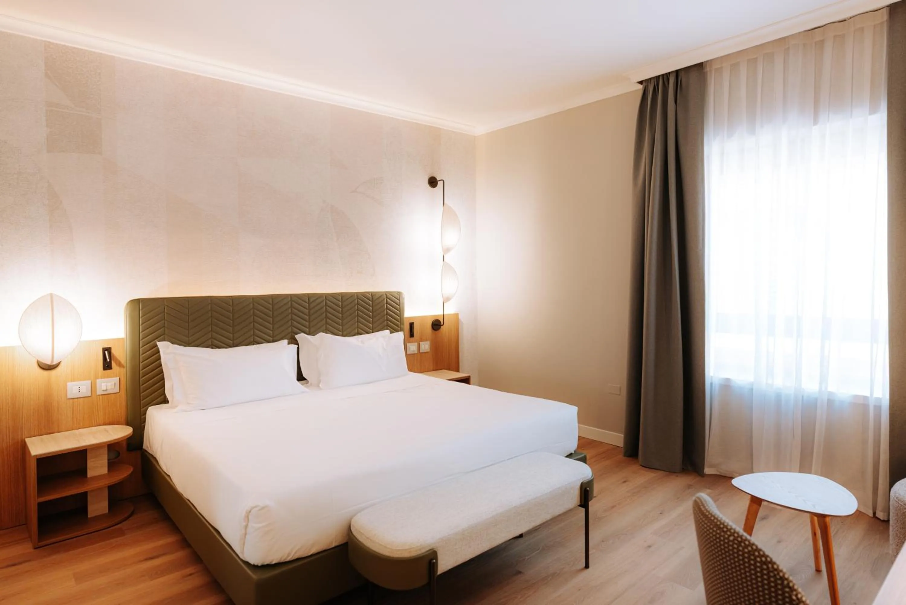 Photo of the whole room, Bed in Mövenpick Hotel Bari