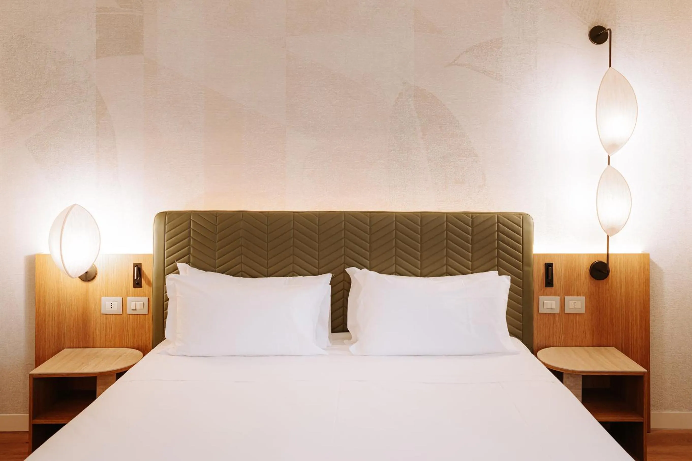 Bed in Mövenpick Hotel Bari