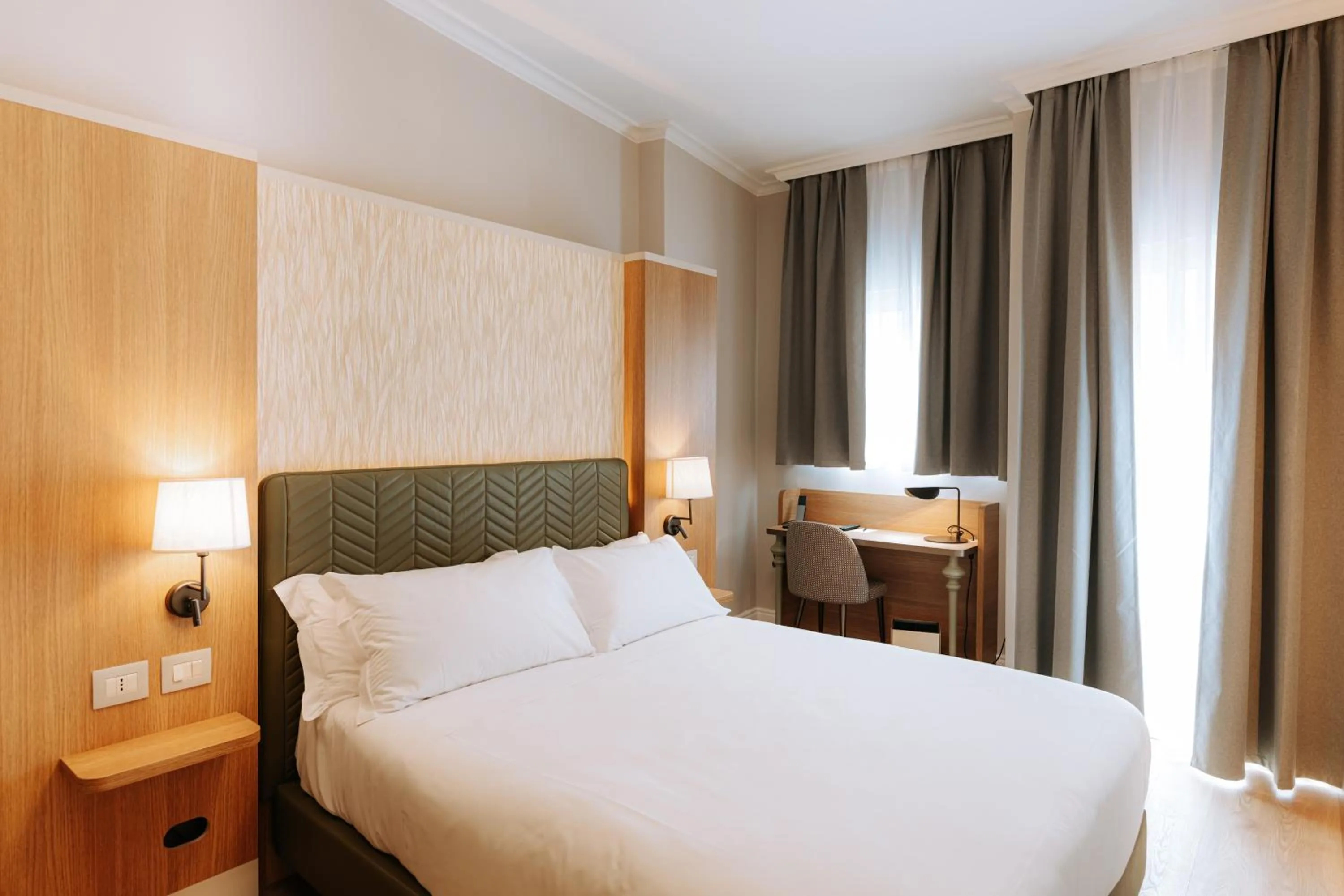 Bed in Mövenpick Hotel Bari