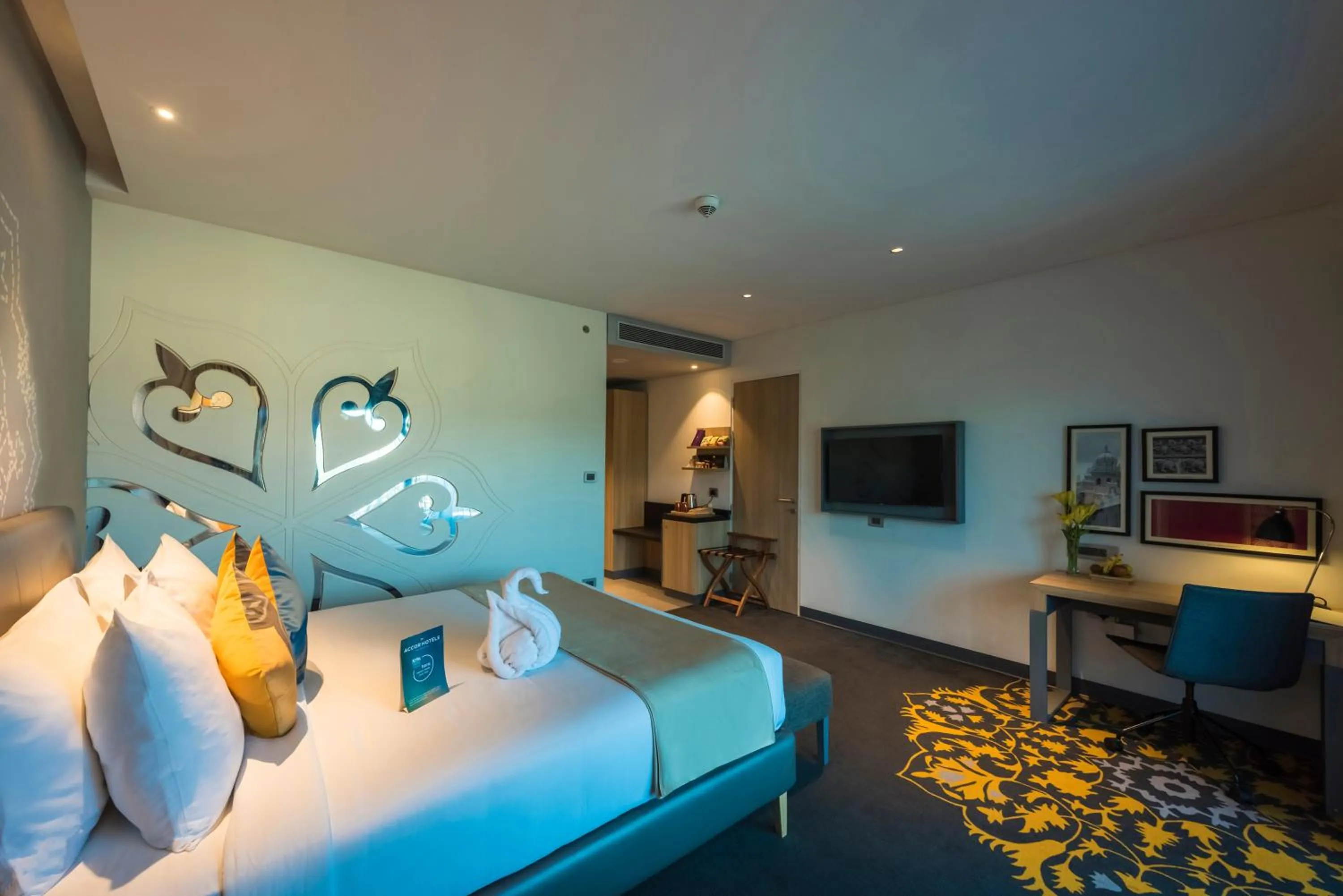 Photo of the whole room, Bed in Grand Mercure Mysore - An Accor Brand