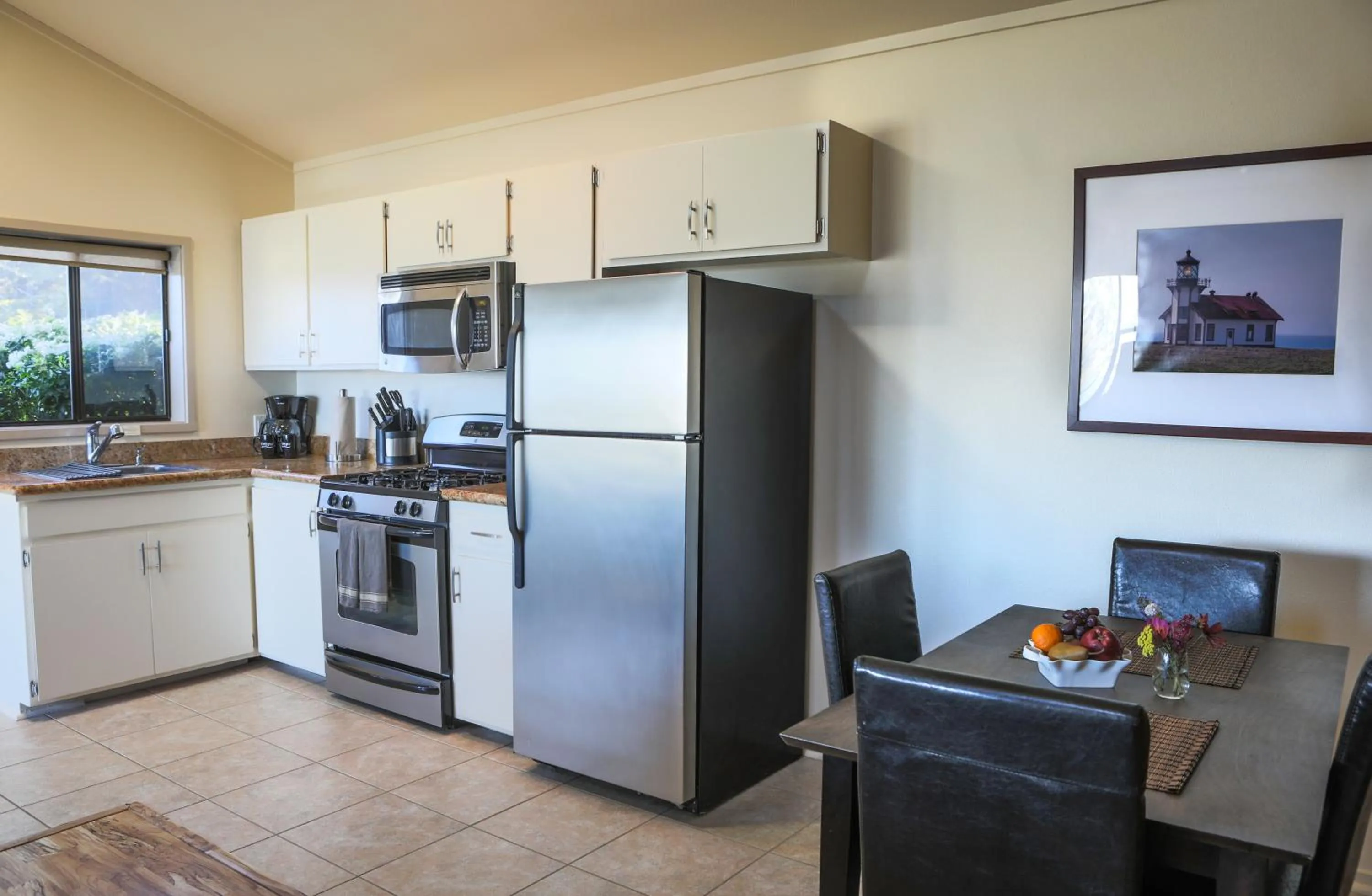 Kitchen or kitchenette in Cottages at Little River Cove