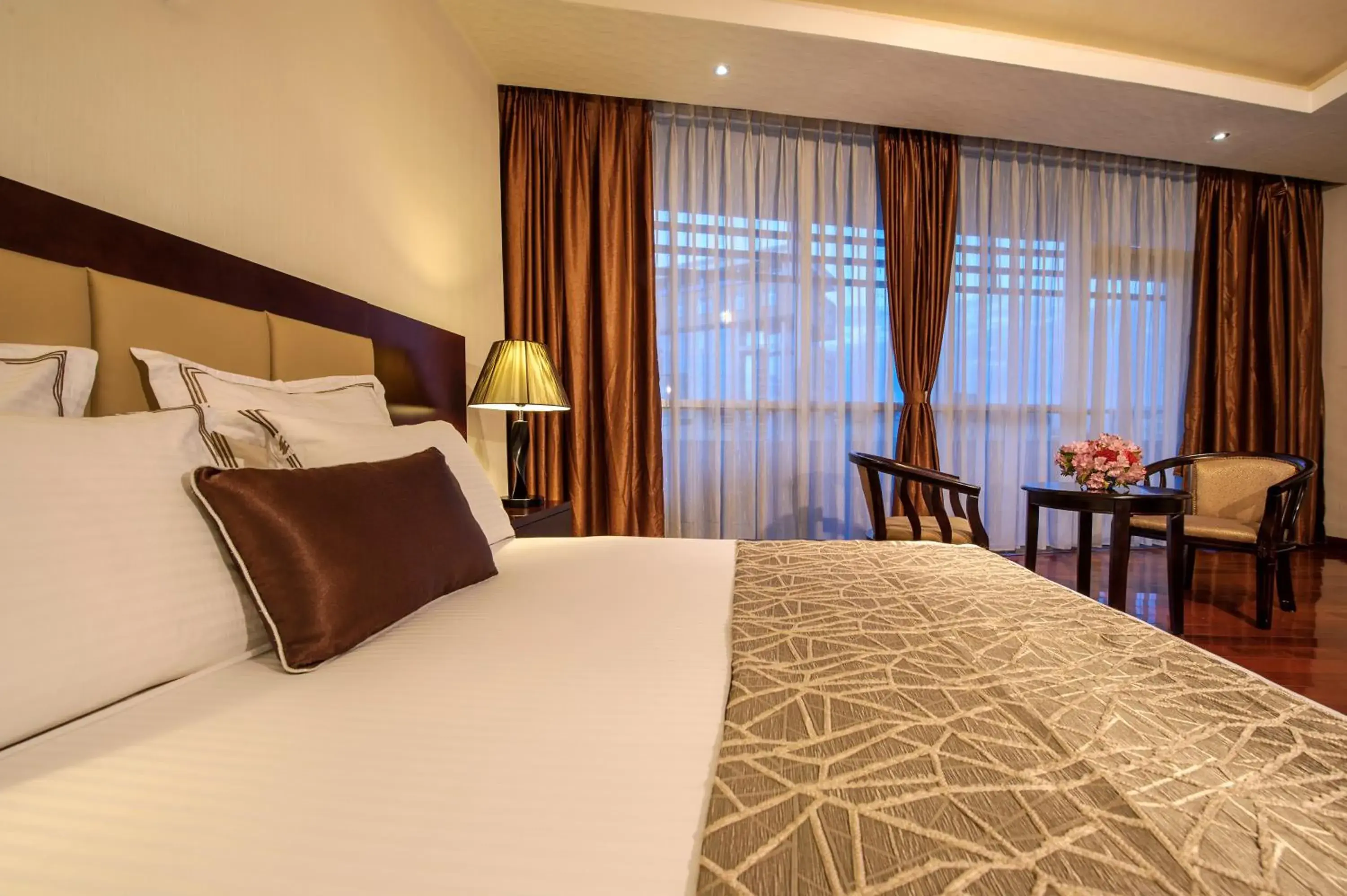 Bed in Grand Eliana Hotel Conference & Spa Bed in Grand Eliana Hotel Conference & Spa