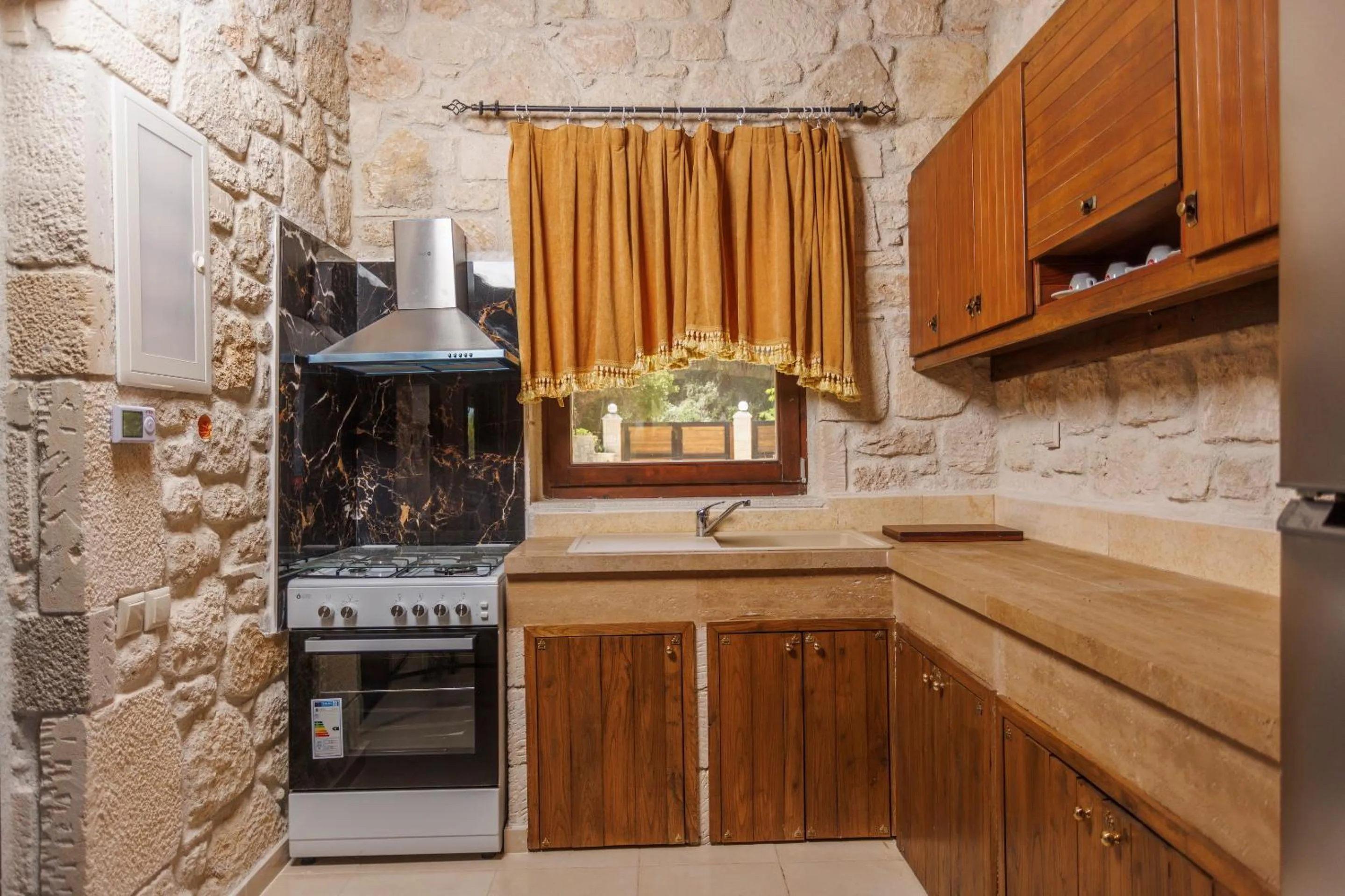 kitchen in Akritas Ef Zin Villas & Suites