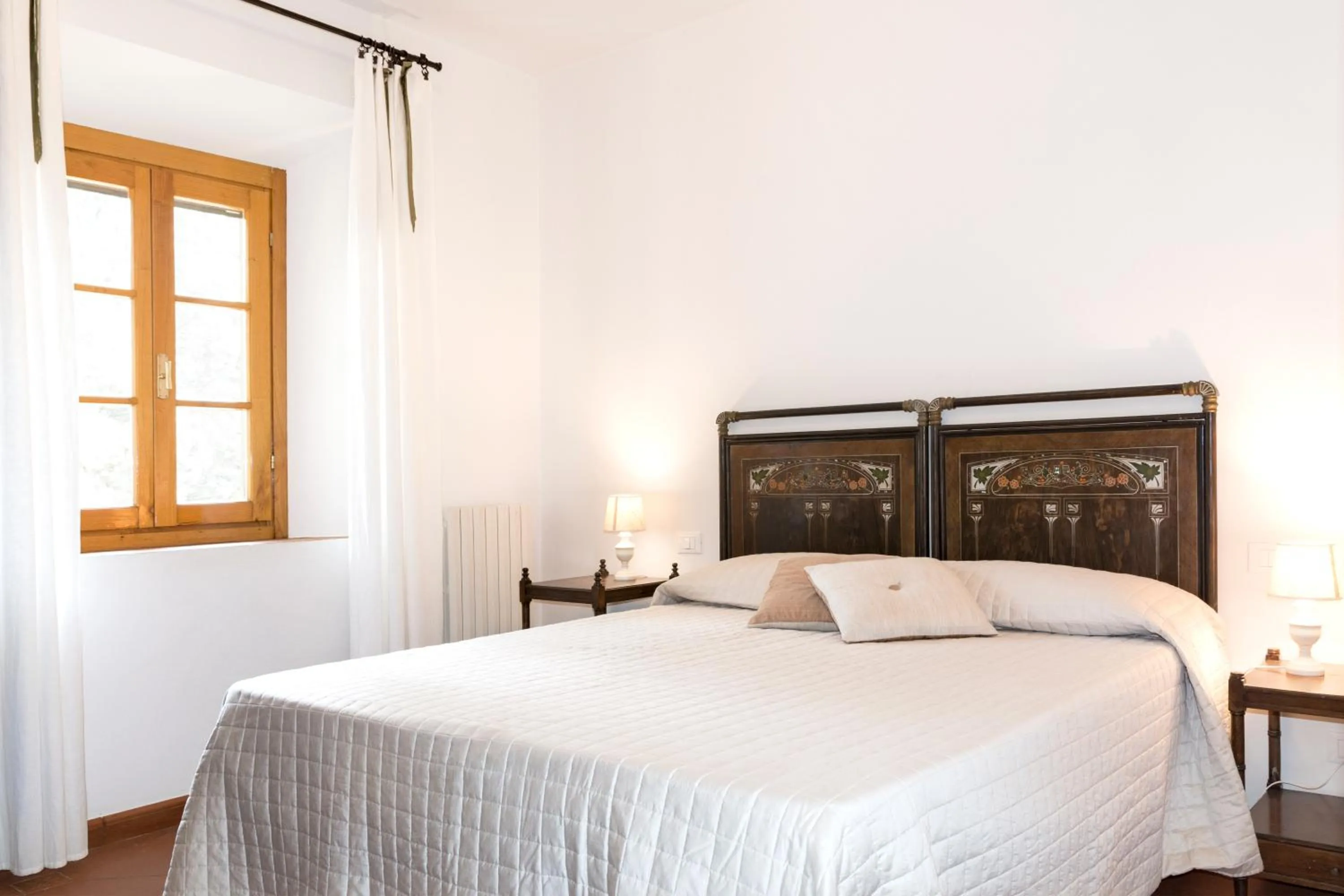 Bed in Agriturismo Podere Rondinaio