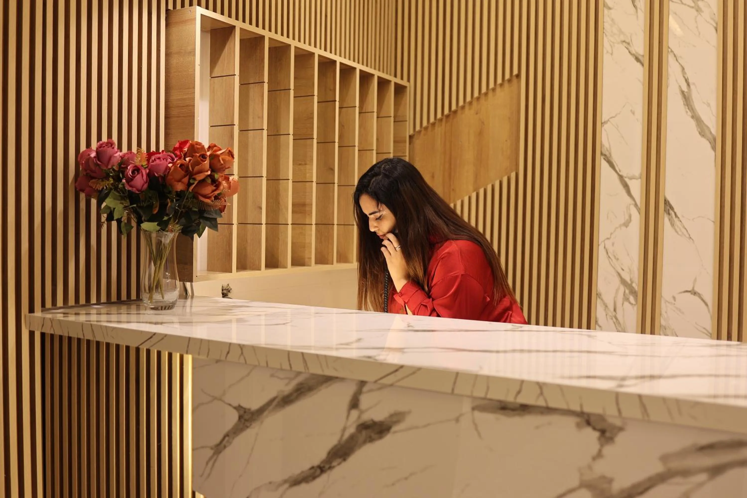 Lobby or reception in Hôtel Des Lilas