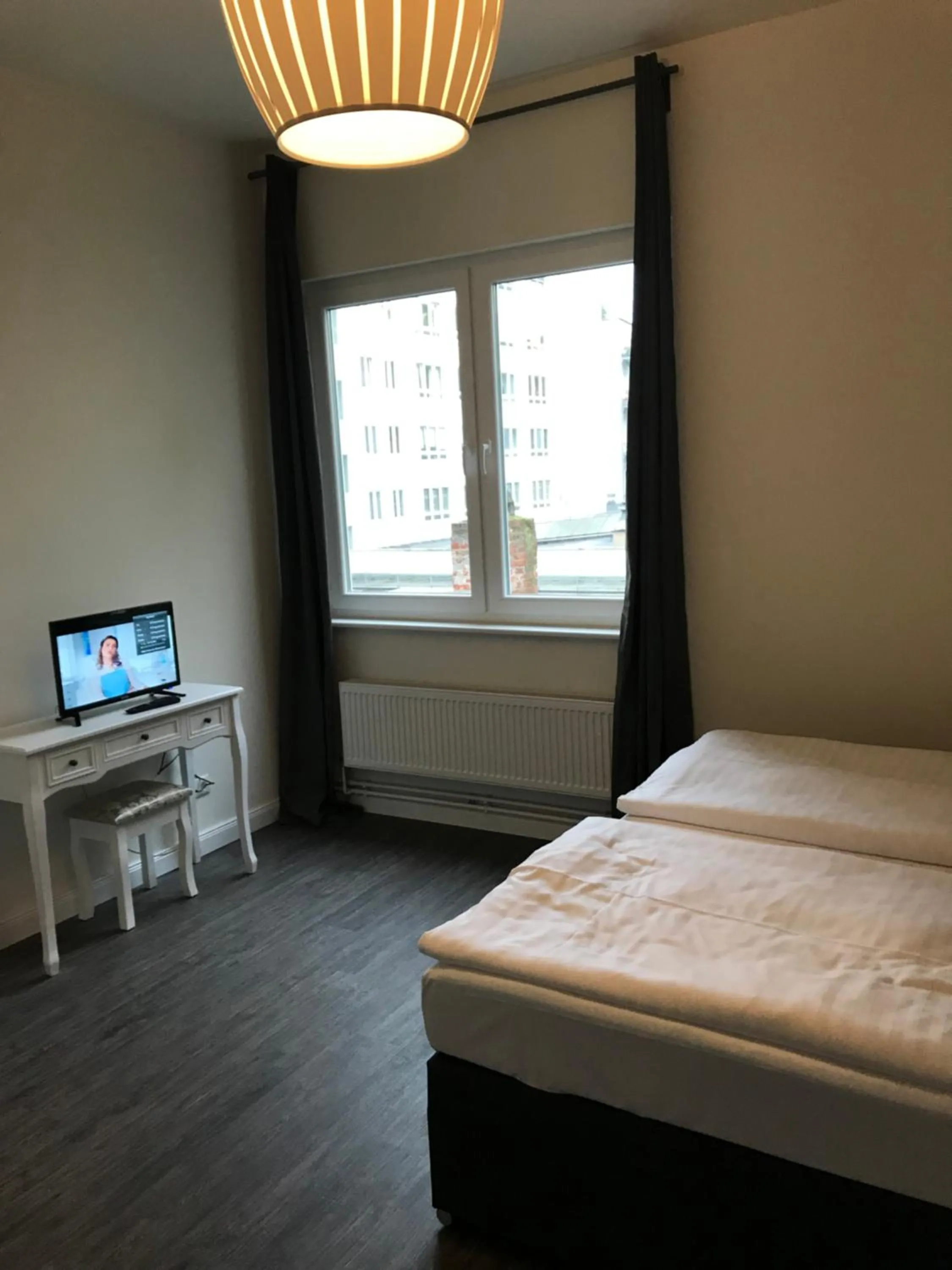 Bed in Hotel Fame am Hauptbahnhof