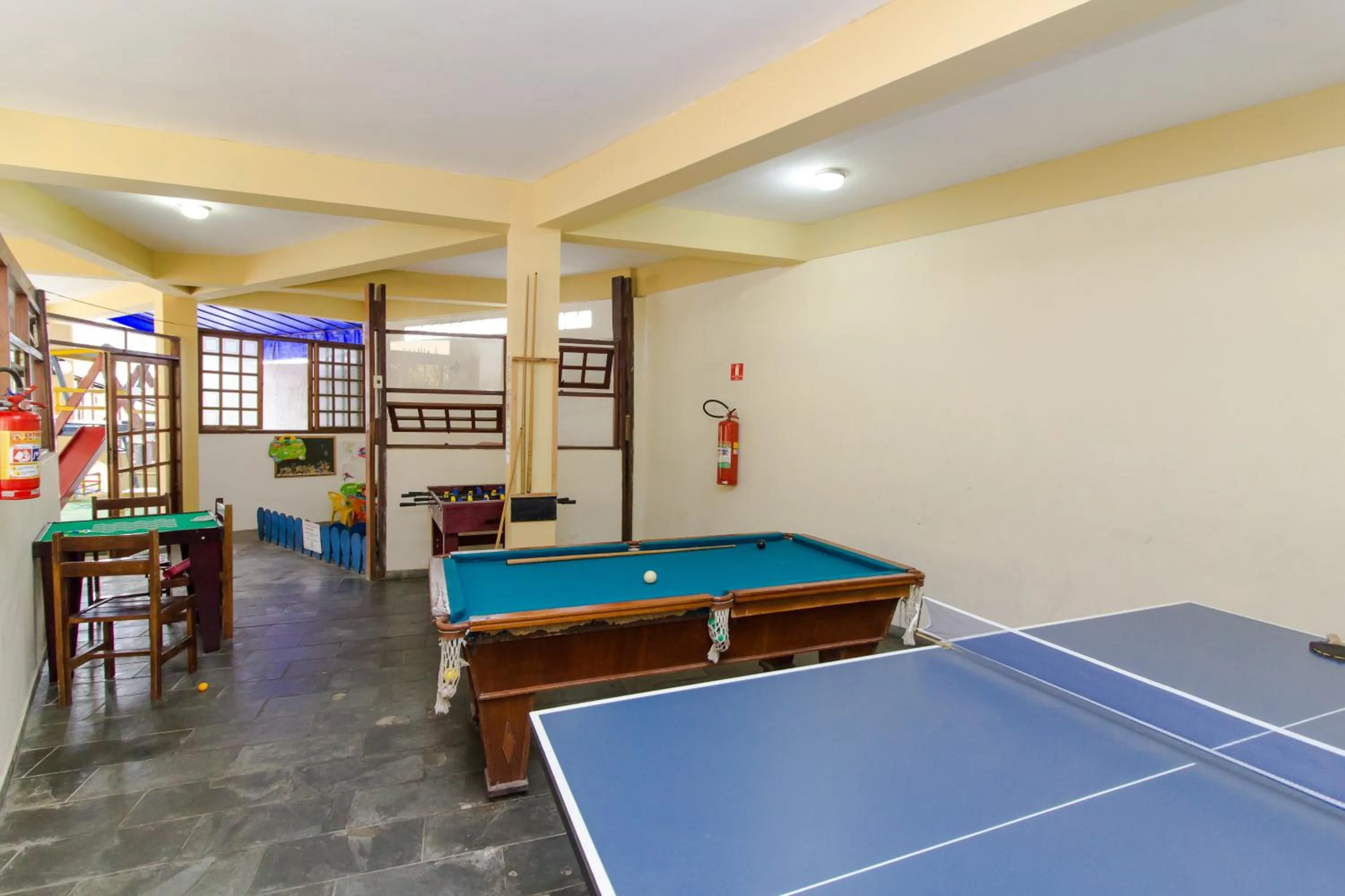 Communal lounge/ TV room in Viamar Pousada