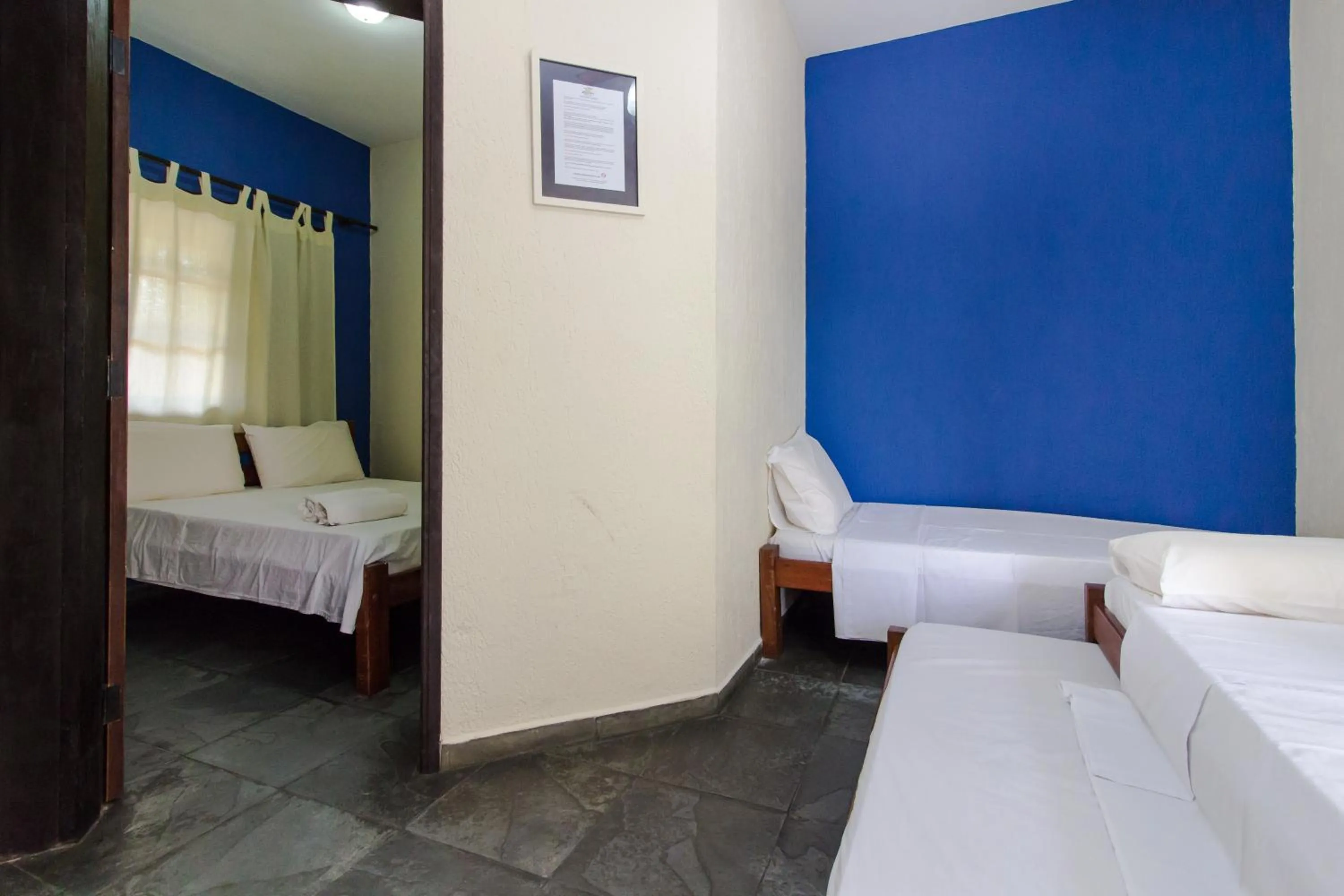 Bed in Viamar Pousada