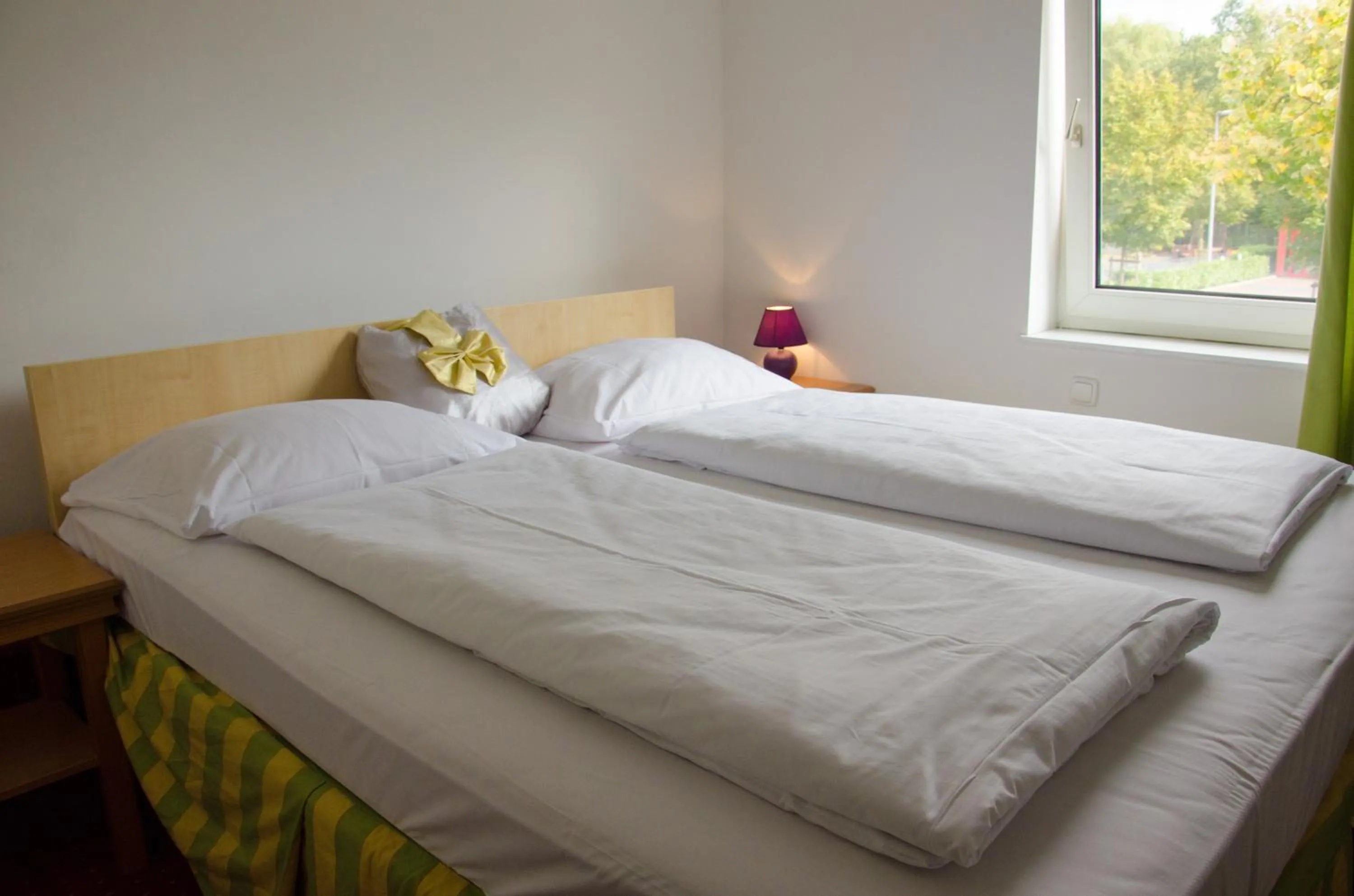 Bed in Panorama Hotel Frankfurt Offenbach Süd