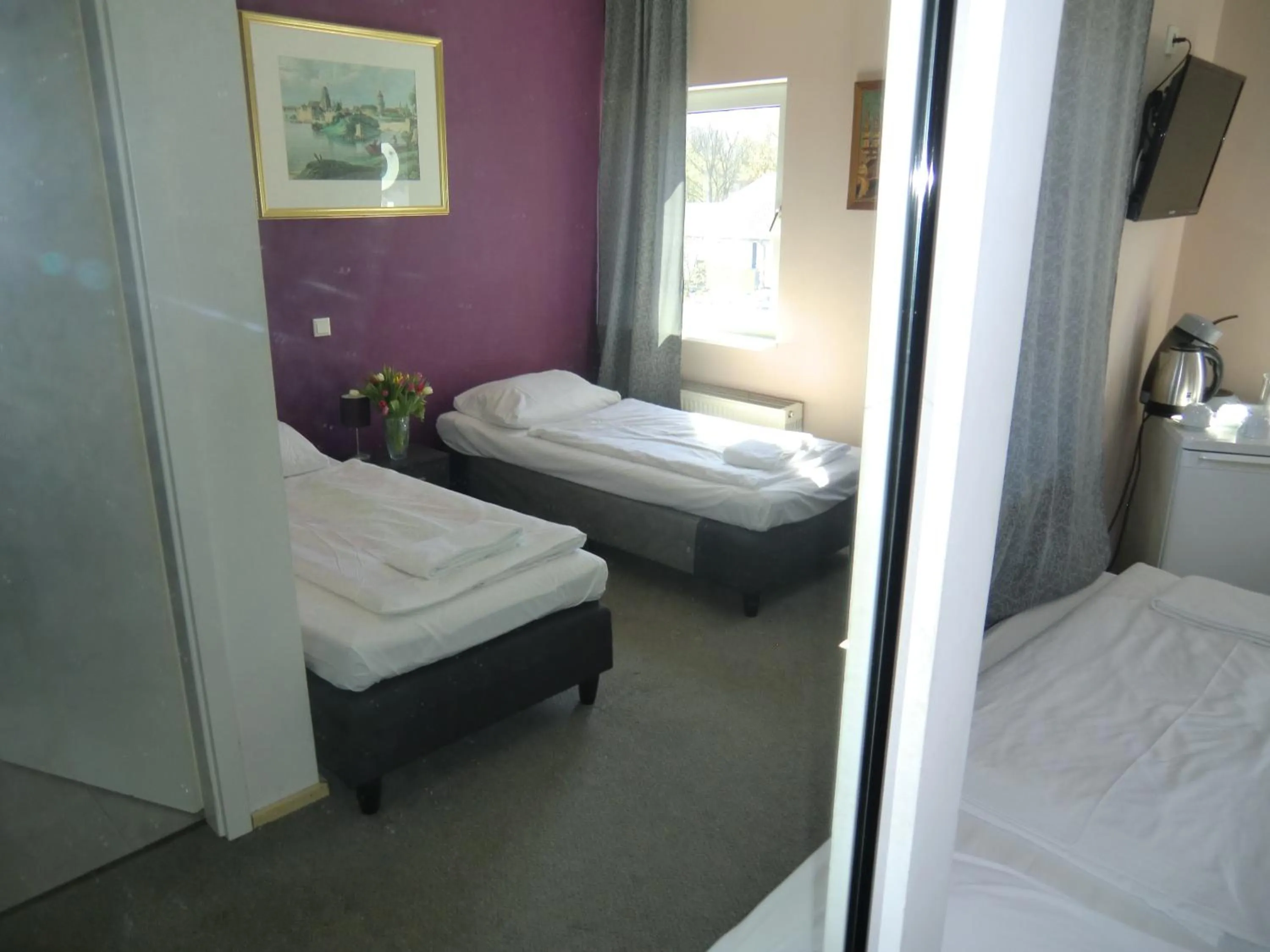 Photo of the whole room, Bed in Panorama Hotel Frankfurt Offenbach Süd